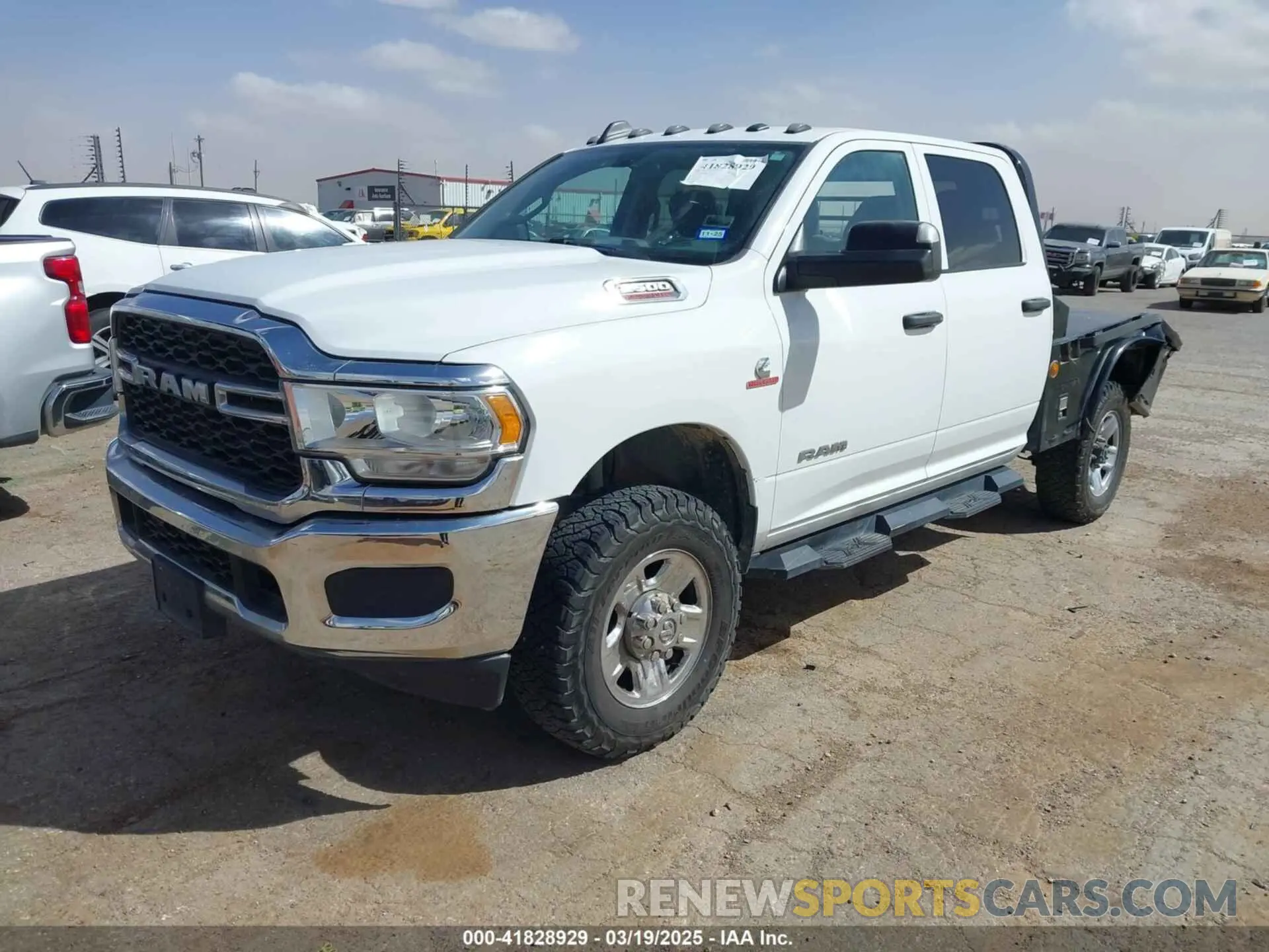 2 Photograph of a damaged car 3C6UR5CLXKG534669 RAM 2500 2019