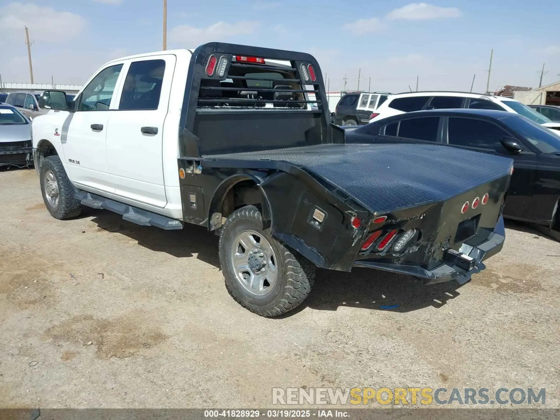 3 Photograph of a damaged car 3C6UR5CLXKG534669 RAM 2500 2019