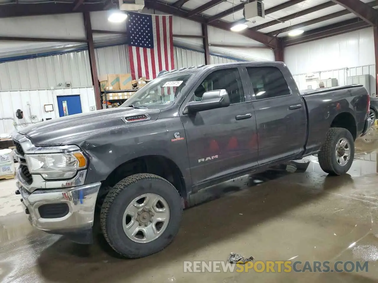 1 Photograph of a damaged car 3C6UR5CLXKG546160 RAM 2500 2019