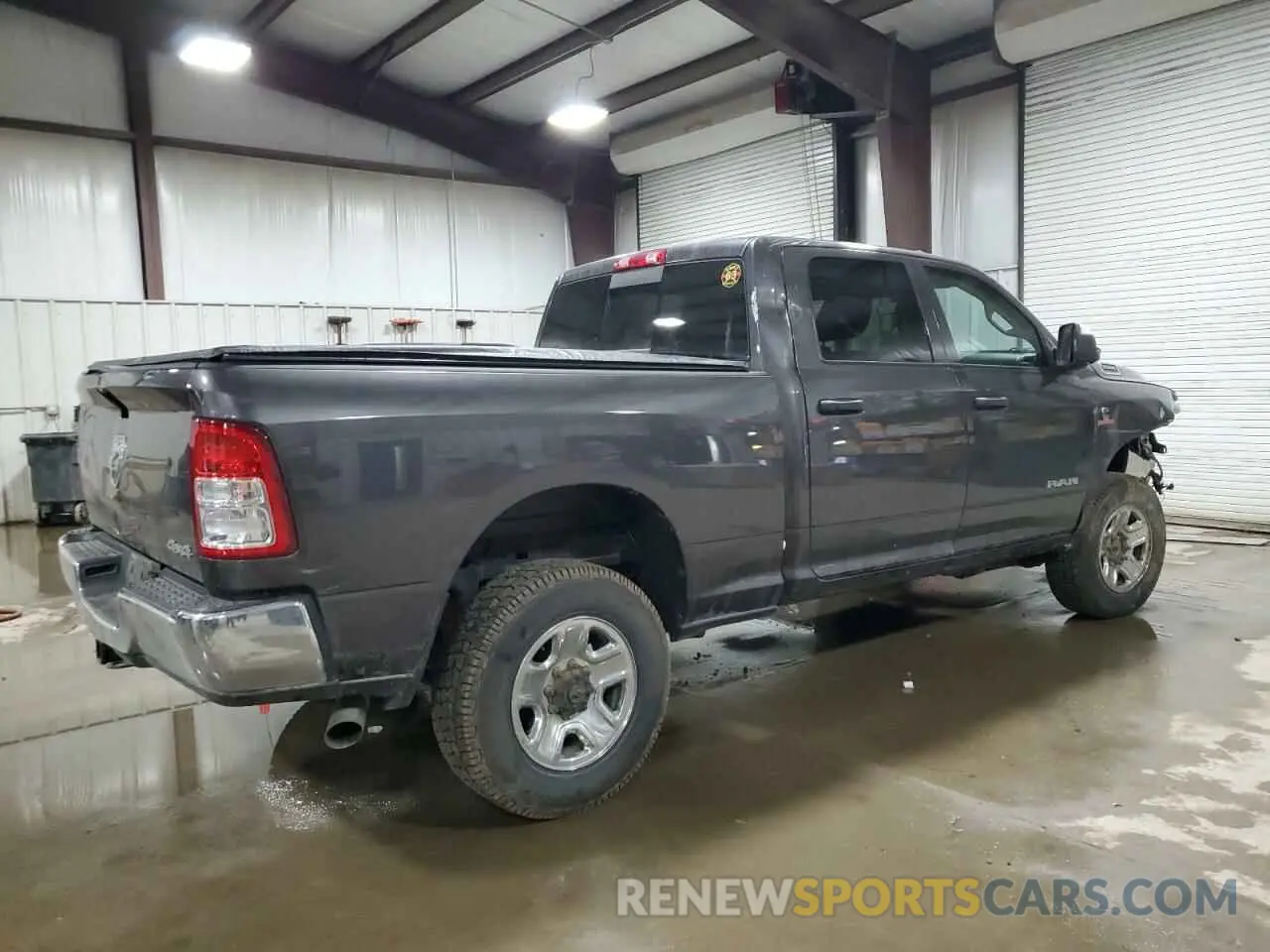 3 Photograph of a damaged car 3C6UR5CLXKG546160 RAM 2500 2019