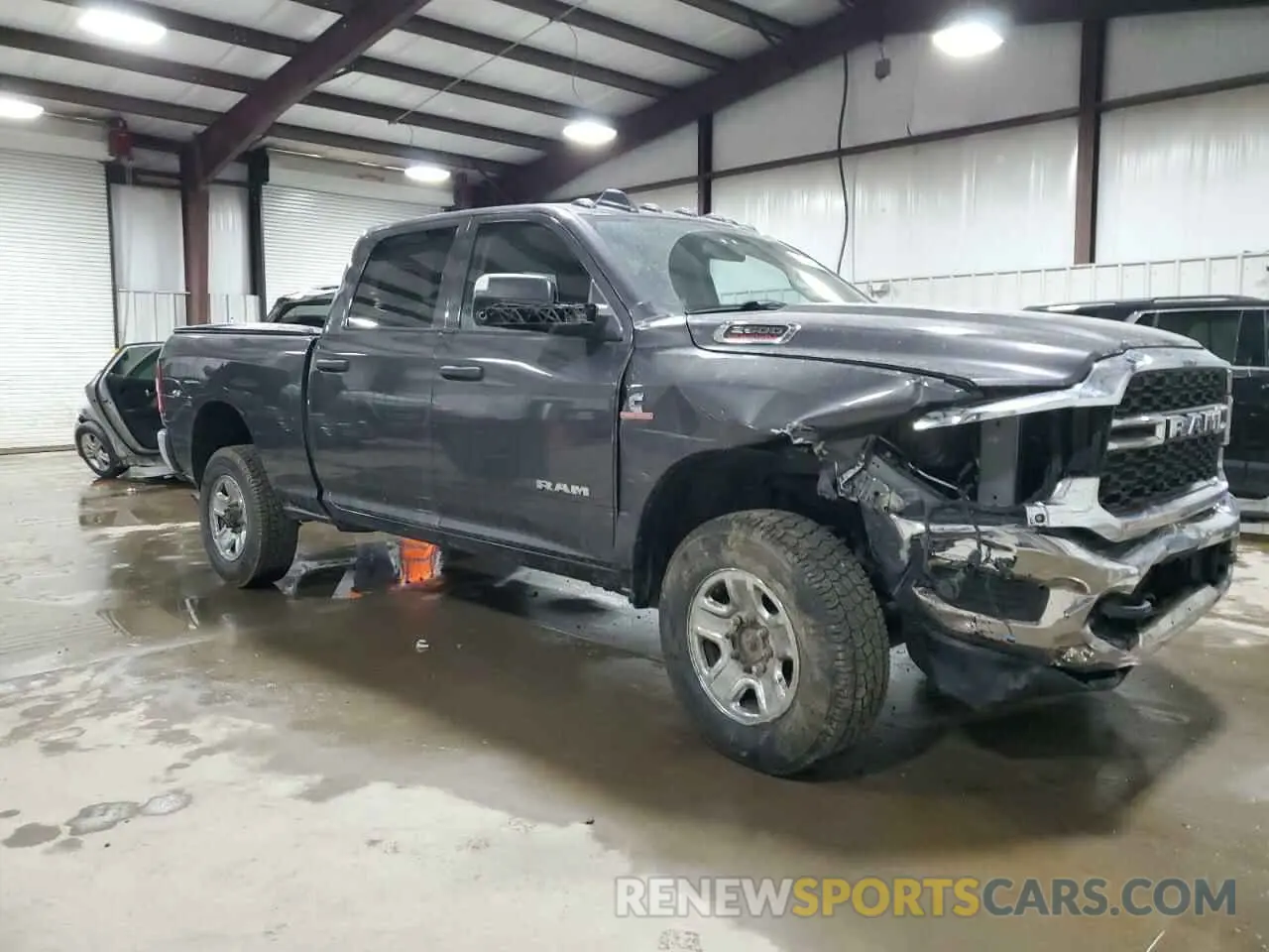 4 Photograph of a damaged car 3C6UR5CLXKG546160 RAM 2500 2019