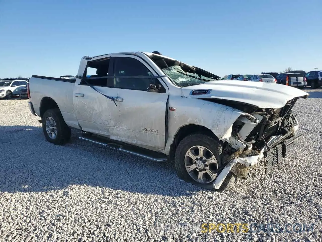 4 Photograph of a damaged car 3C6UR5DJ1KG697868 RAM 2500 2019