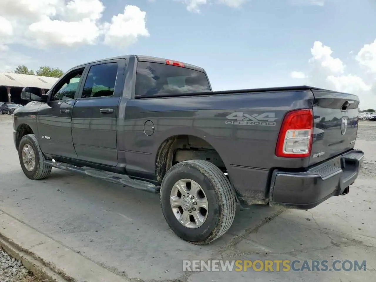 2 Photograph of a damaged car 3C6UR5DJ4KG520621 RAM 2500 2019