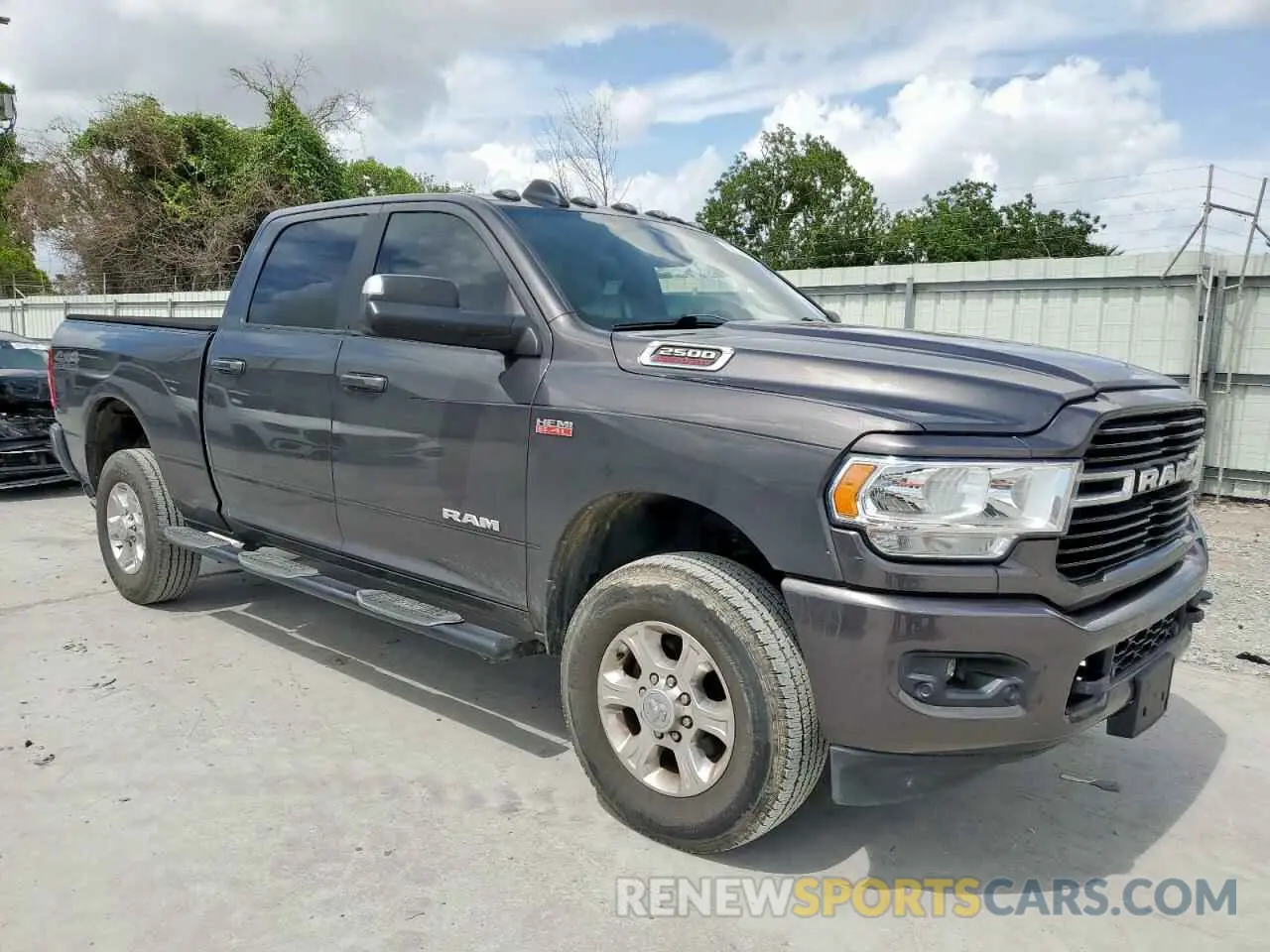 4 Photograph of a damaged car 3C6UR5DJ4KG520621 RAM 2500 2019
