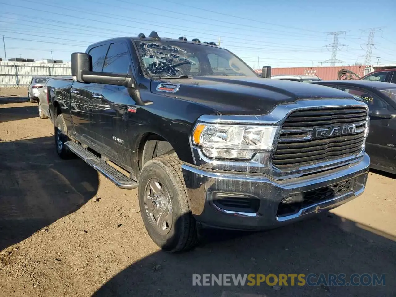 4 Photograph of a damaged car 3C6UR5DJ6KG611129 RAM 2500 2019