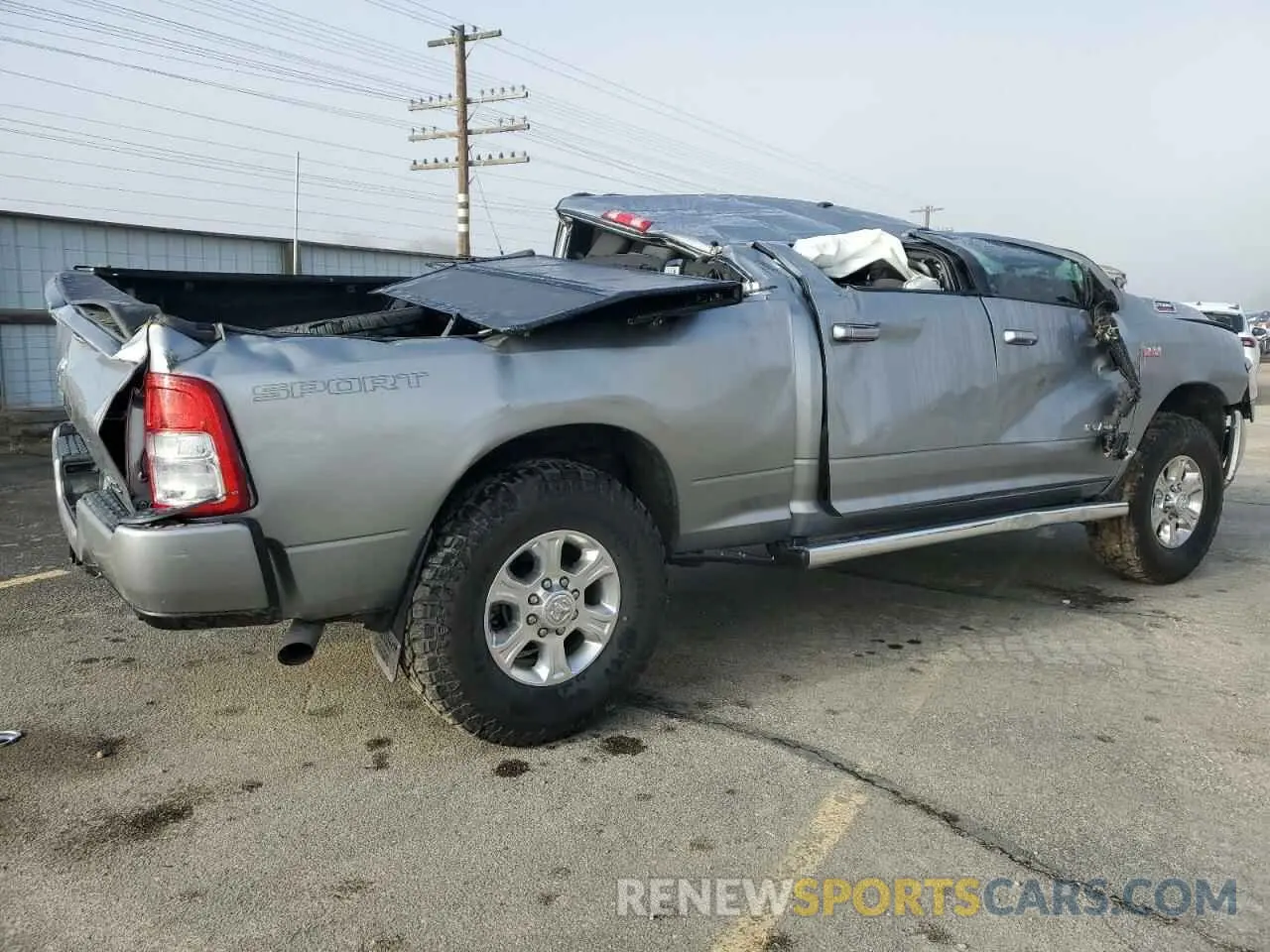 3 Photograph of a damaged car 3C6UR5DJ9KG608533 RAM 2500 2019