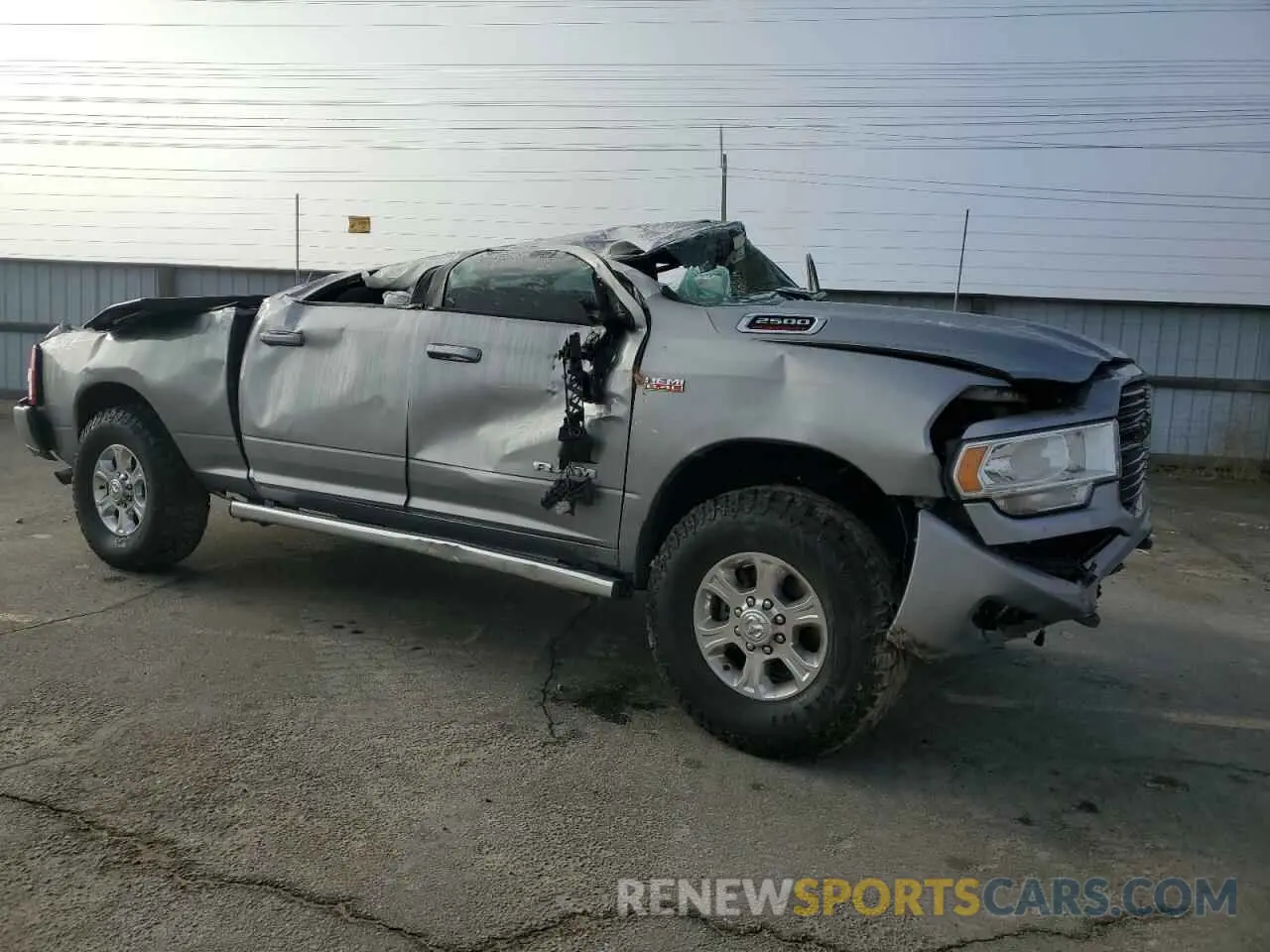 4 Photograph of a damaged car 3C6UR5DJ9KG608533 RAM 2500 2019