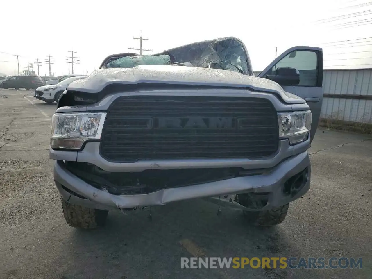 5 Photograph of a damaged car 3C6UR5DJ9KG608533 RAM 2500 2019