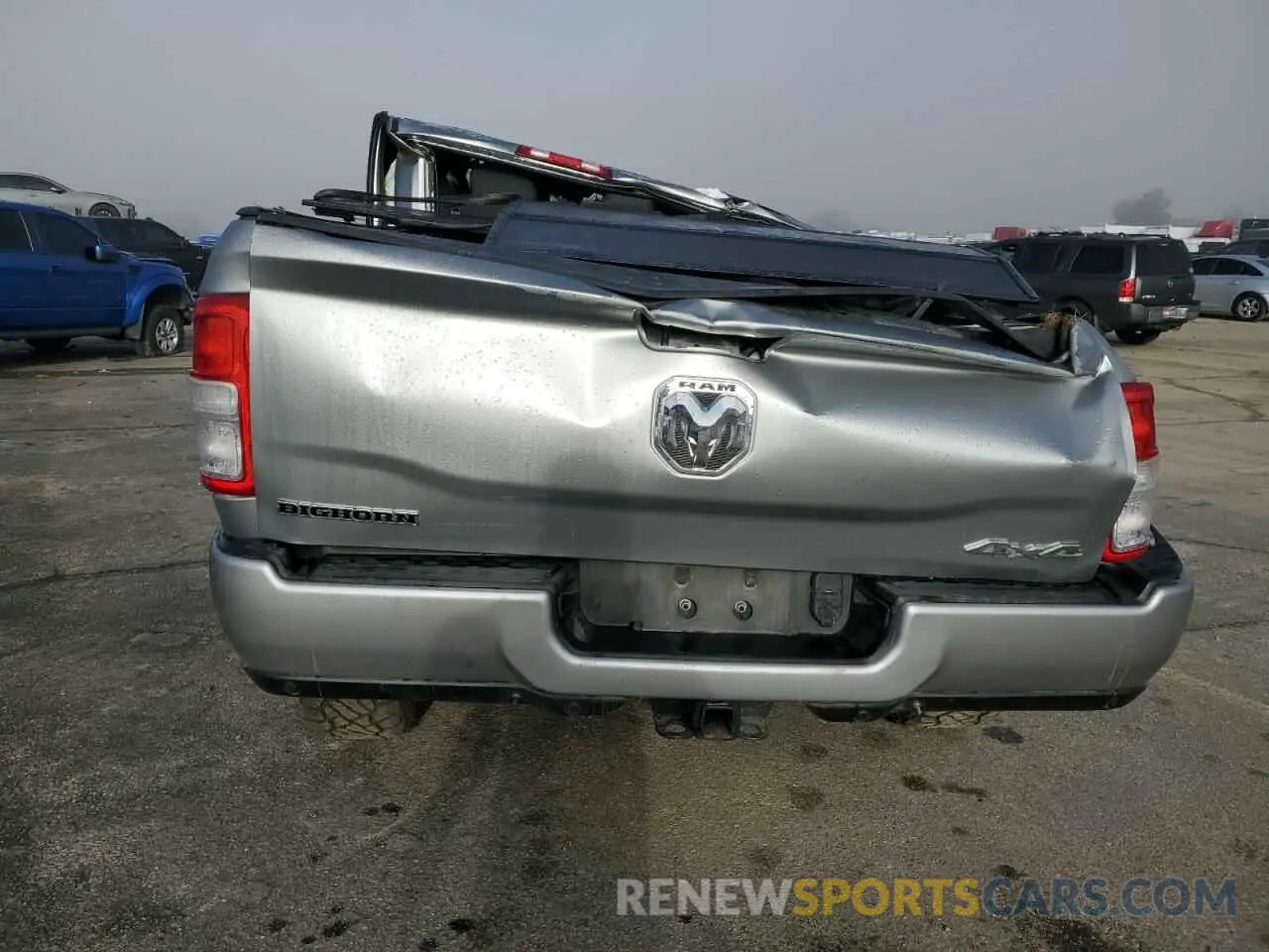 6 Photograph of a damaged car 3C6UR5DJ9KG608533 RAM 2500 2019
