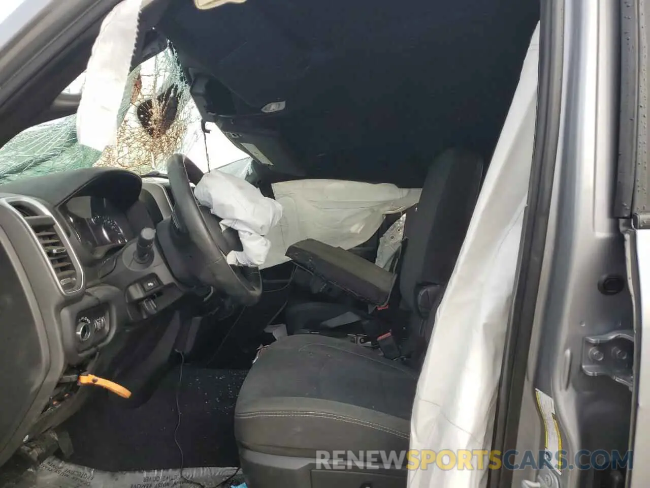 7 Photograph of a damaged car 3C6UR5DJ9KG608533 RAM 2500 2019