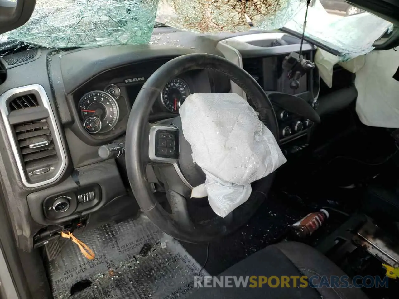 8 Photograph of a damaged car 3C6UR5DJ9KG608533 RAM 2500 2019