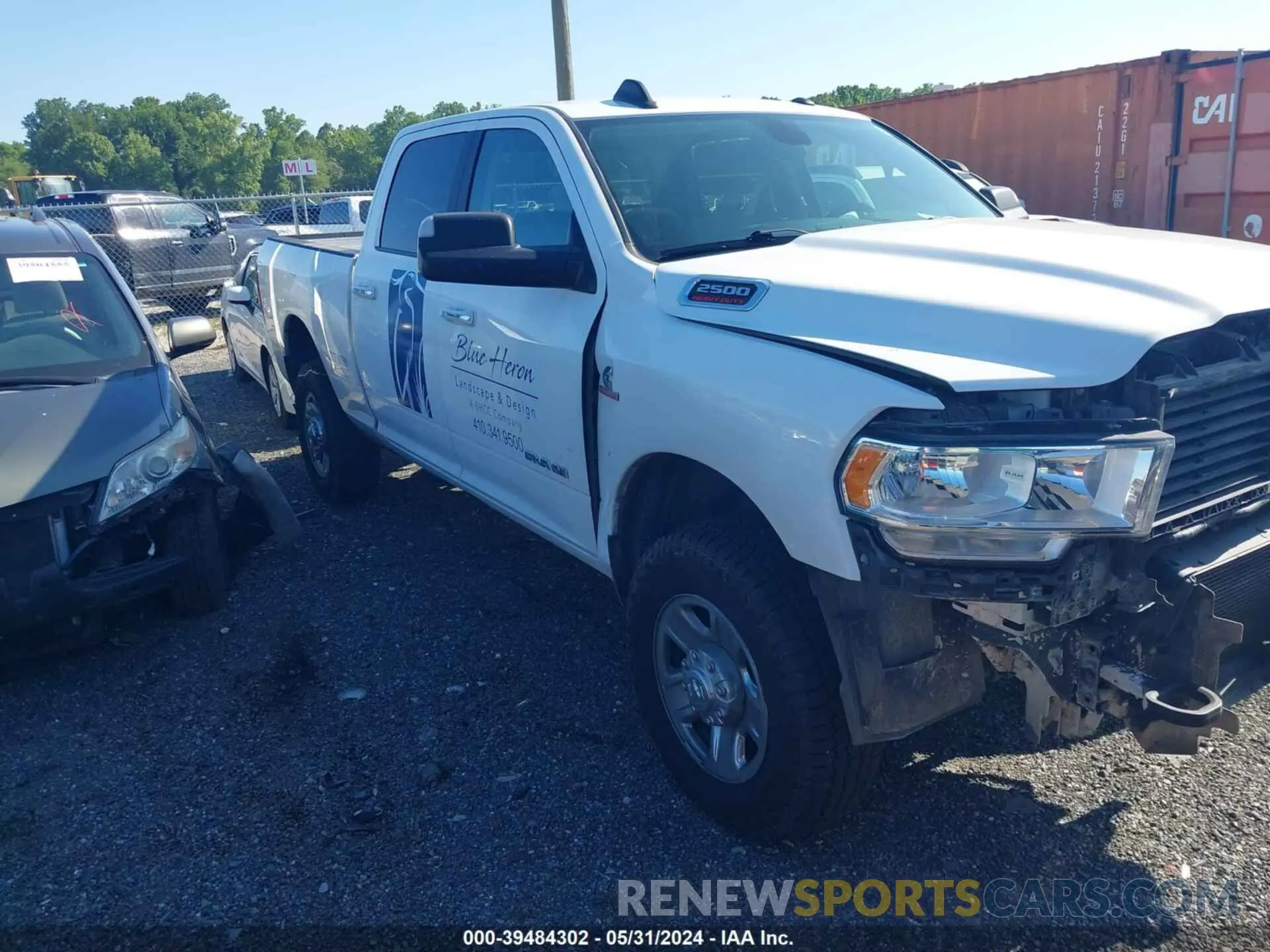 13 Photograph of a damaged car 3C6UR5DL1KG620922 RAM 2500 2019