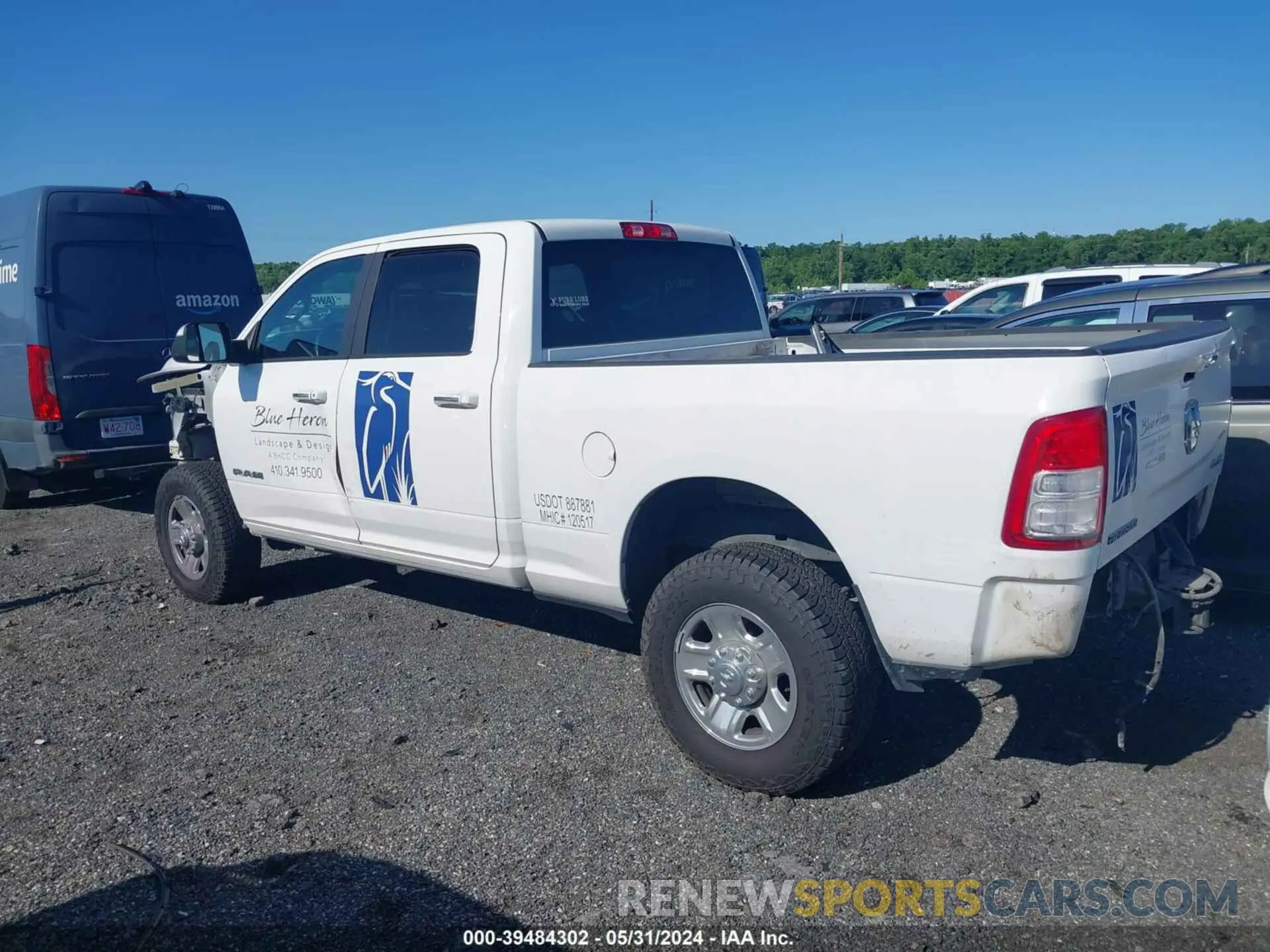 14 Photograph of a damaged car 3C6UR5DL1KG620922 RAM 2500 2019