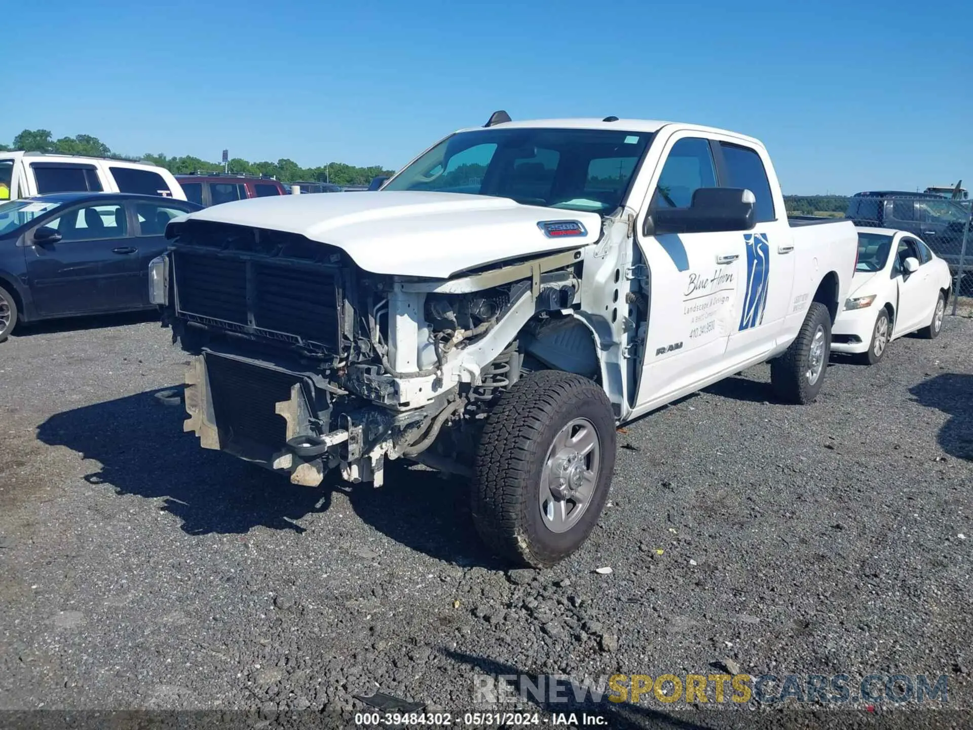 2 Photograph of a damaged car 3C6UR5DL1KG620922 RAM 2500 2019