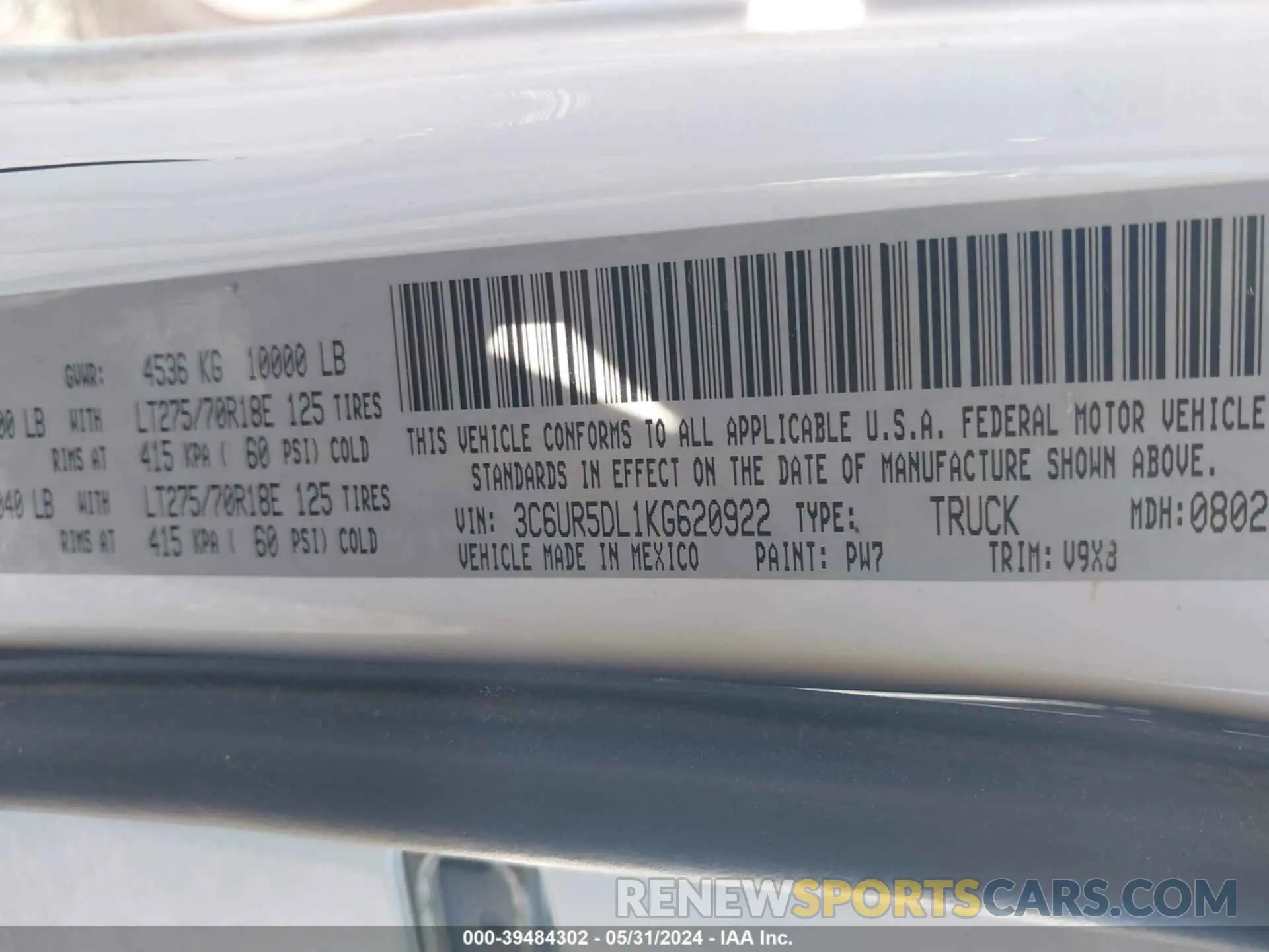 9 Photograph of a damaged car 3C6UR5DL1KG620922 RAM 2500 2019