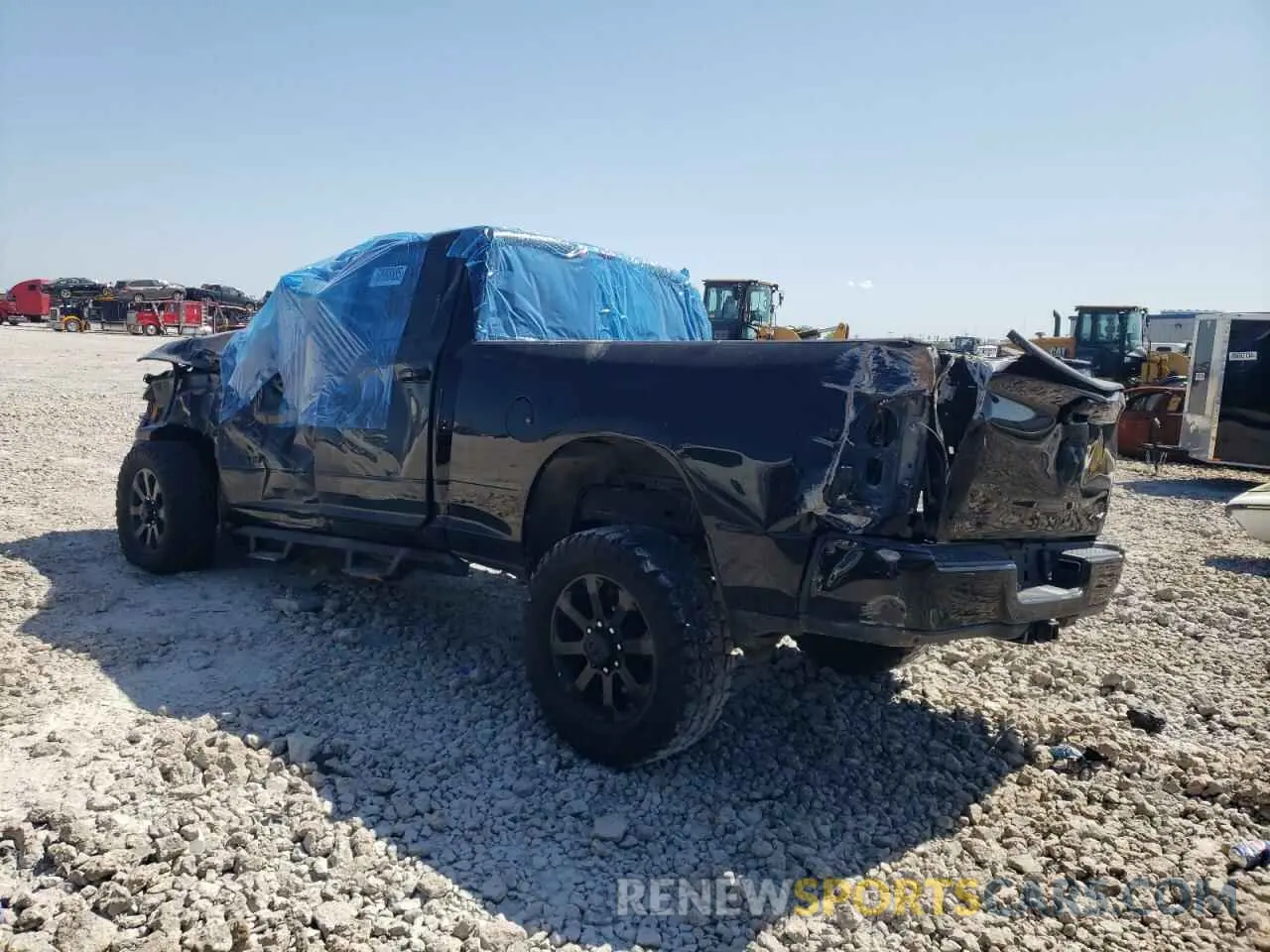 2 Photograph of a damaged car 3C6UR5DL1KG641088 RAM 2500 2019