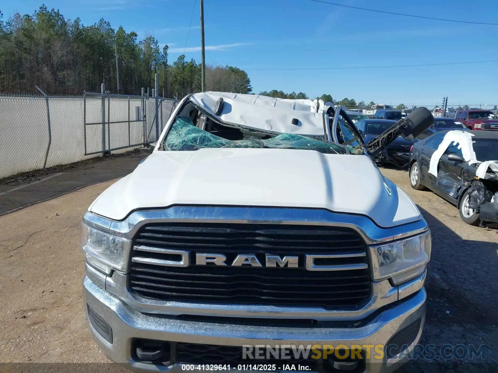 6 Photograph of a damaged car 3C6UR5DL1KG663656 RAM 2500 2019