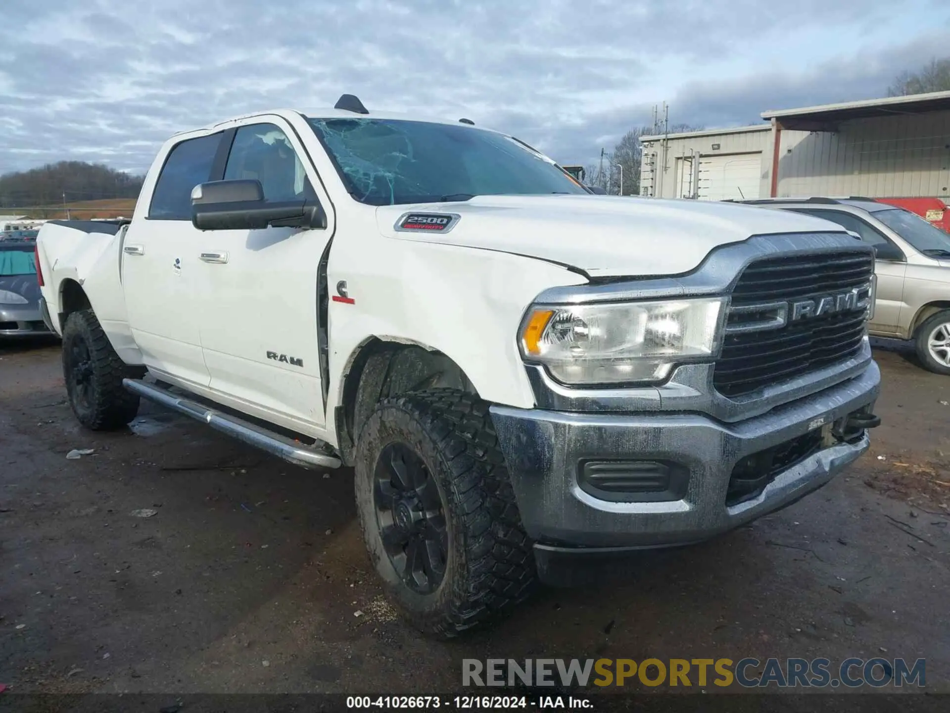 1 Photograph of a damaged car 3C6UR5DL2KG544594 RAM 2500 2019