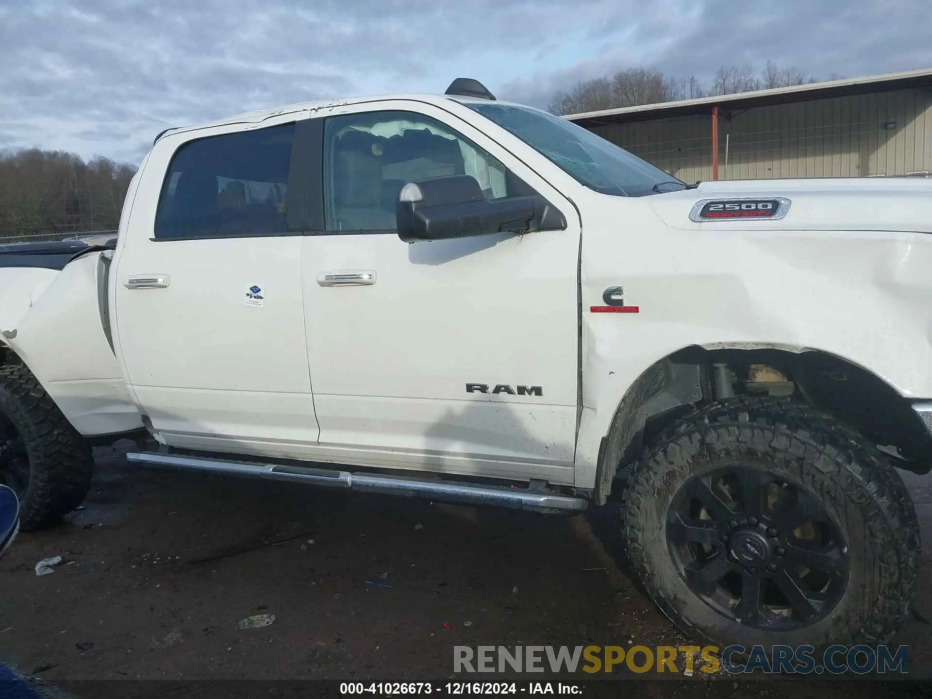13 Photograph of a damaged car 3C6UR5DL2KG544594 RAM 2500 2019