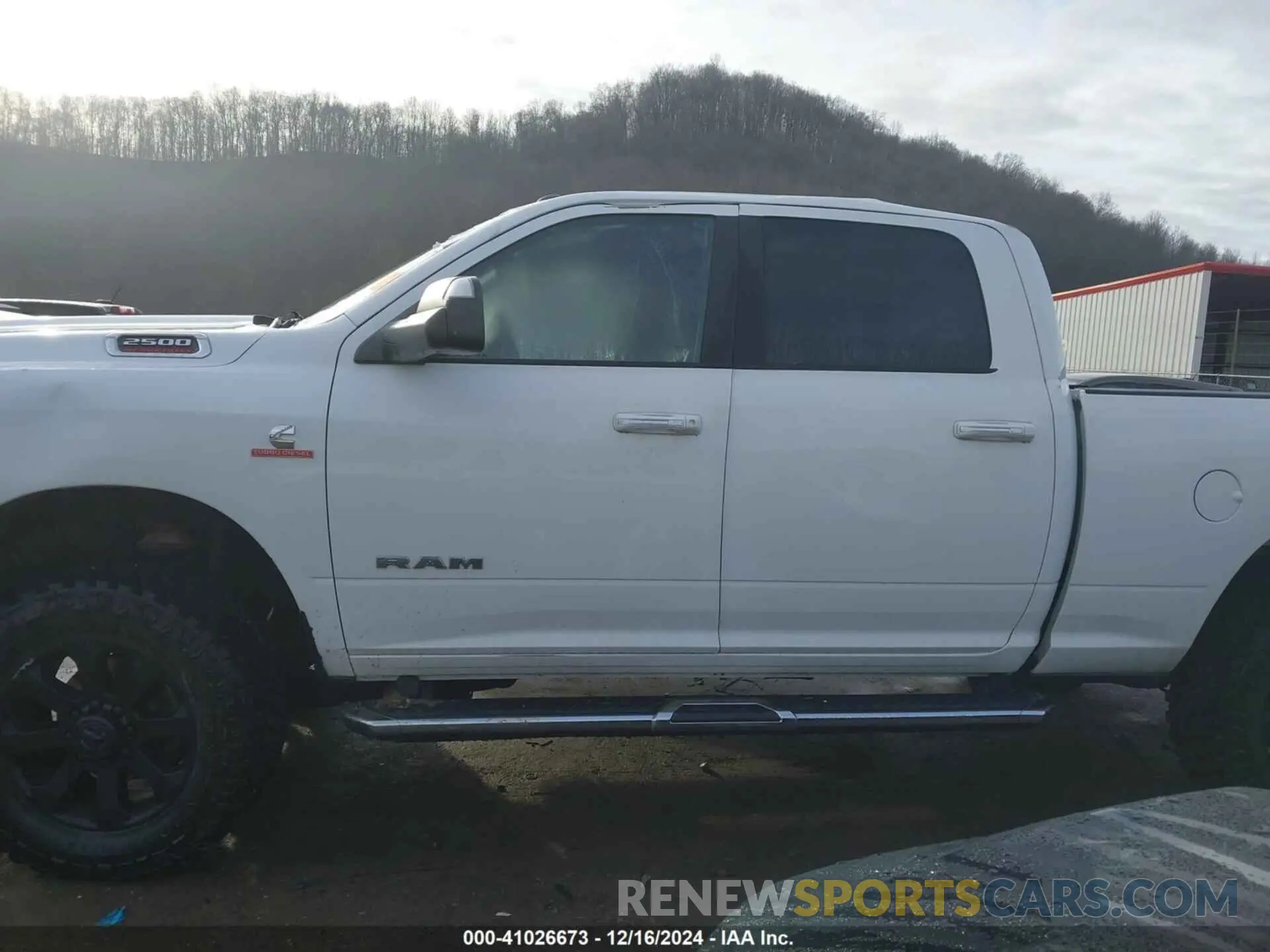 14 Photograph of a damaged car 3C6UR5DL2KG544594 RAM 2500 2019