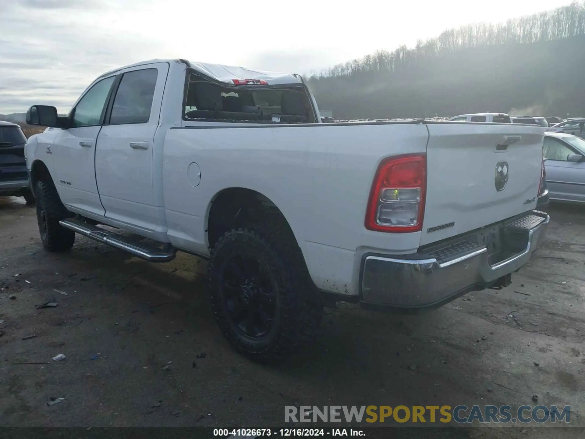 3 Photograph of a damaged car 3C6UR5DL2KG544594 RAM 2500 2019