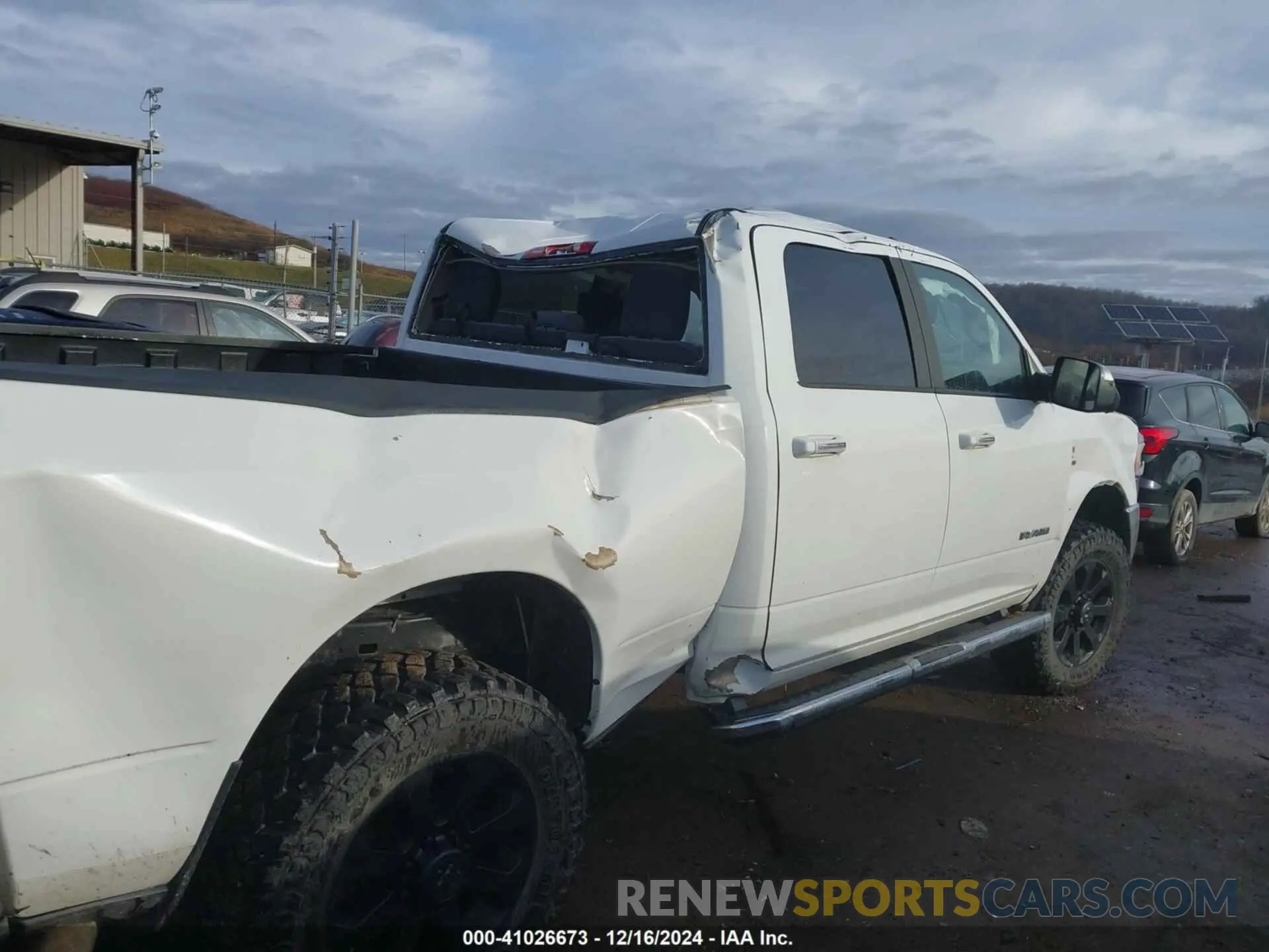 6 Photograph of a damaged car 3C6UR5DL2KG544594 RAM 2500 2019