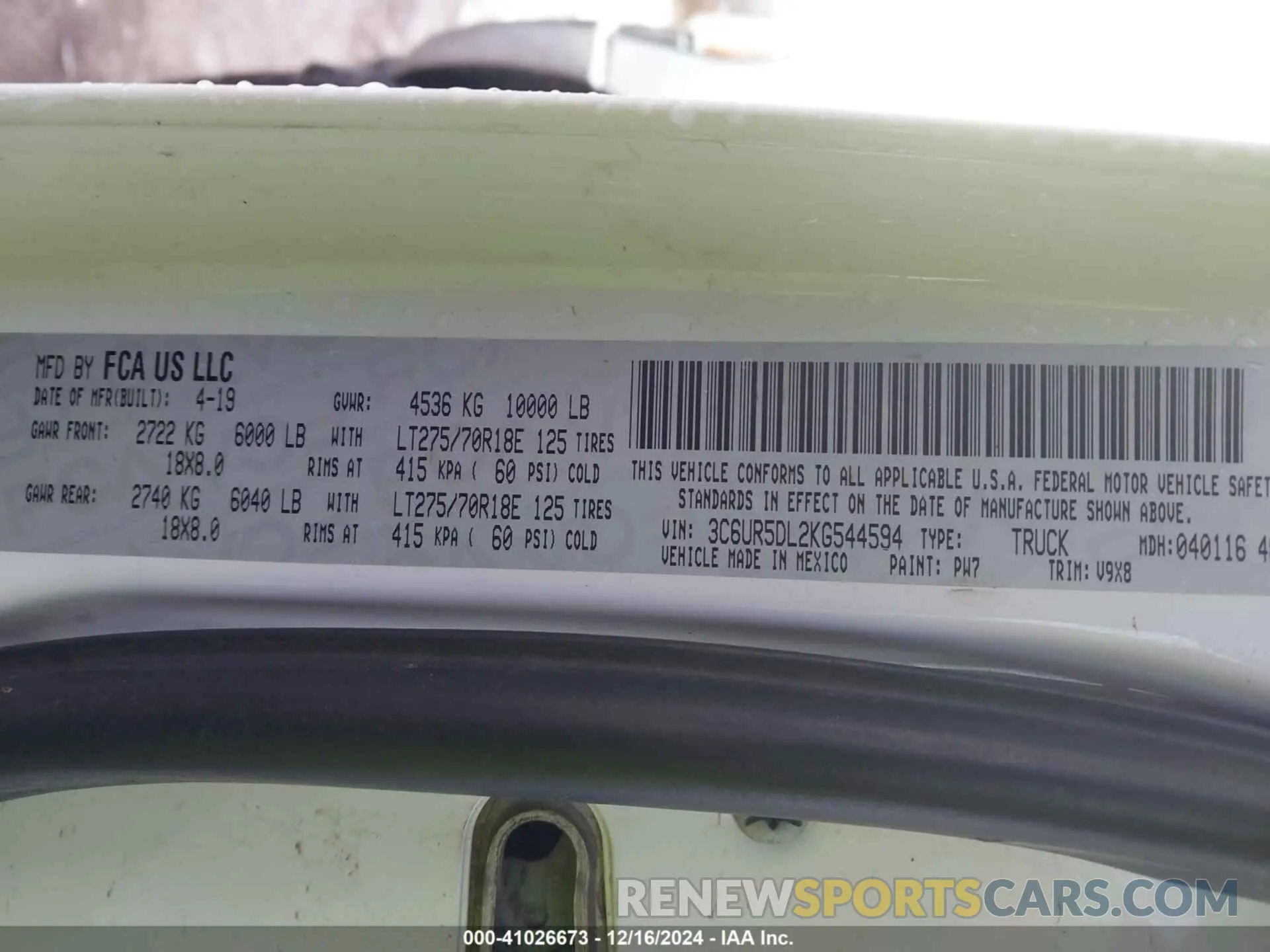 9 Photograph of a damaged car 3C6UR5DL2KG544594 RAM 2500 2019