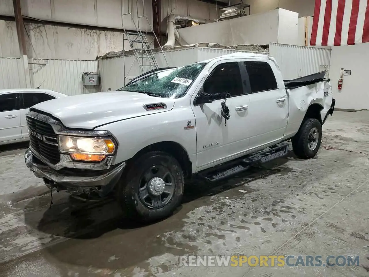 1 Photograph of a damaged car 3C6UR5DL2KG586389 RAM 2500 2019