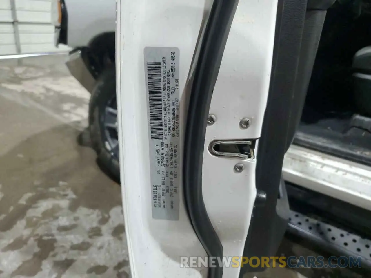 12 Photograph of a damaged car 3C6UR5DL2KG586389 RAM 2500 2019
