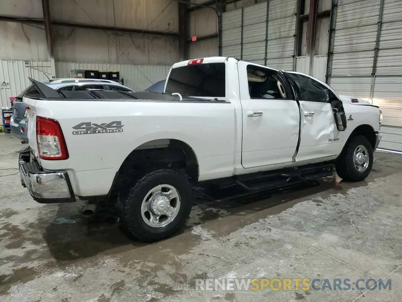 3 Photograph of a damaged car 3C6UR5DL2KG586389 RAM 2500 2019
