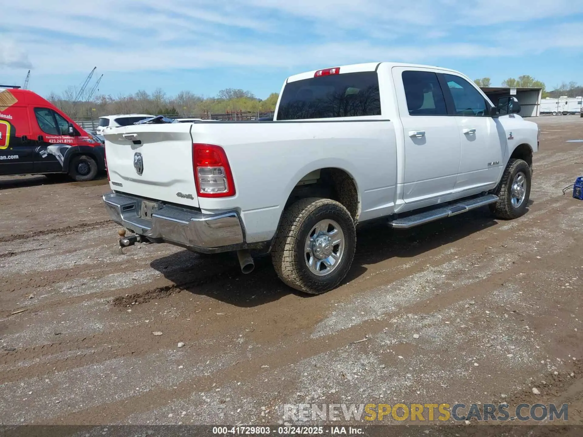 4 Photograph of a damaged car 3C6UR5DL2KG675282 RAM 2500 2019