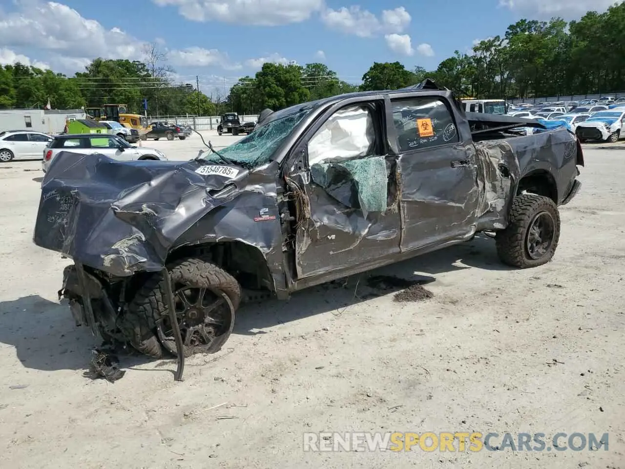 1 Photograph of a damaged car 3C6UR5DL3KG559671 RAM 2500 2019