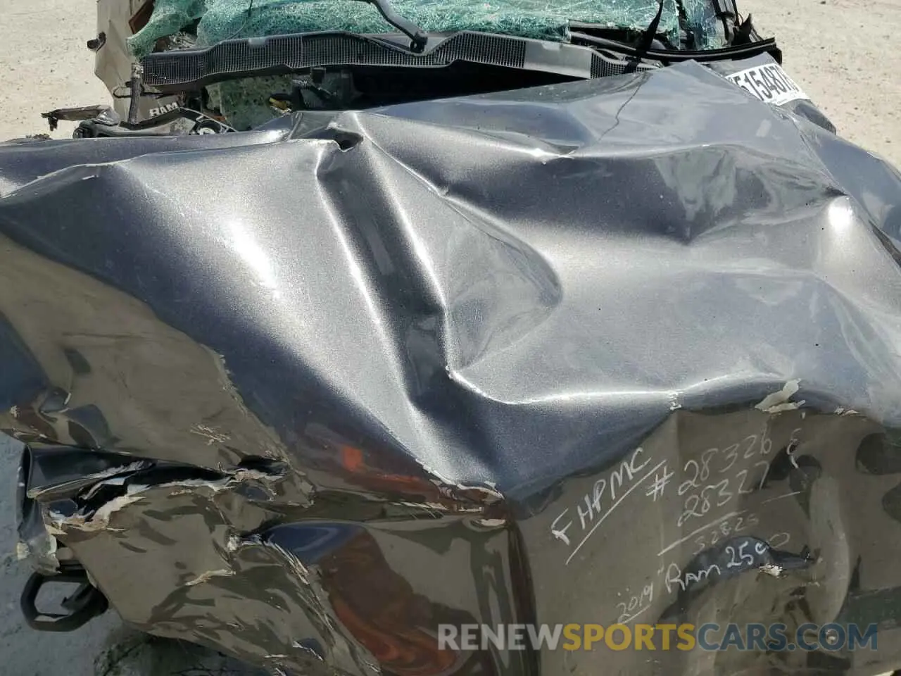 12 Photograph of a damaged car 3C6UR5DL3KG559671 RAM 2500 2019