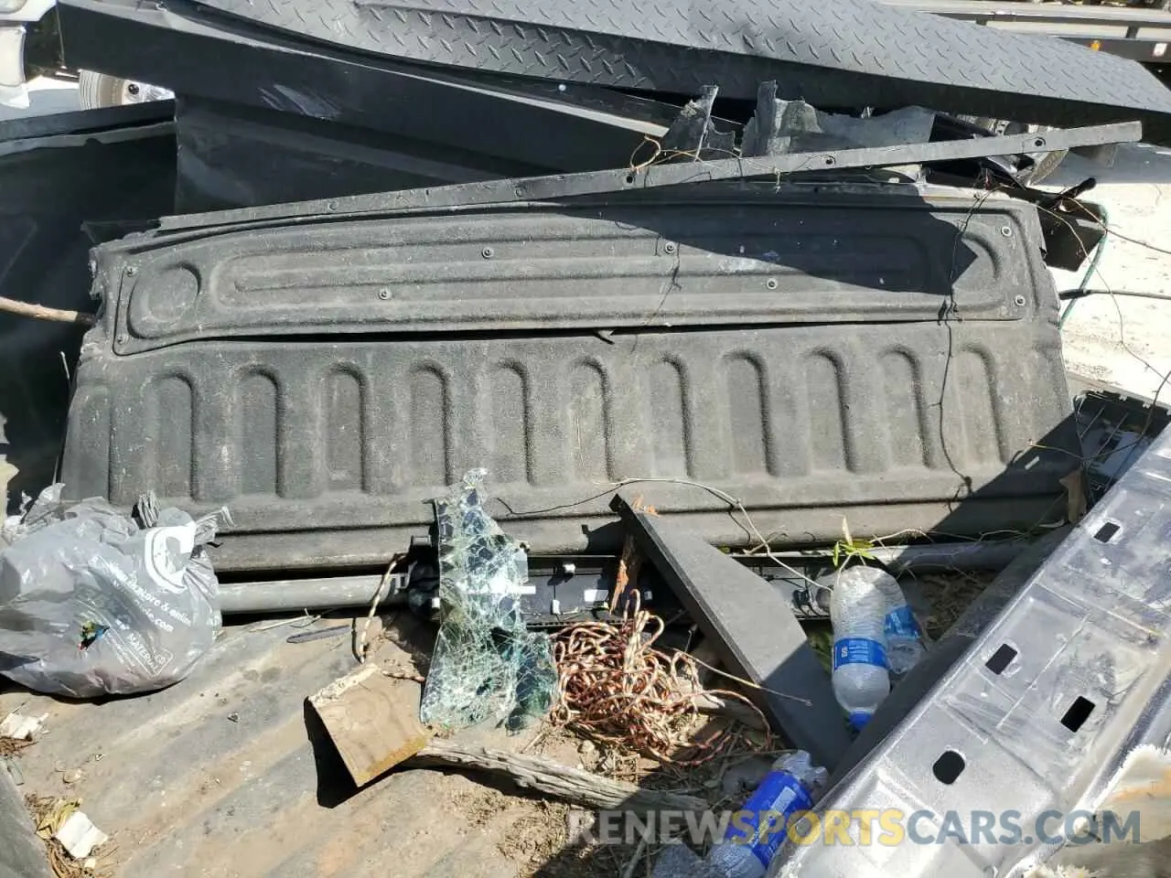 13 Photograph of a damaged car 3C6UR5DL3KG559671 RAM 2500 2019