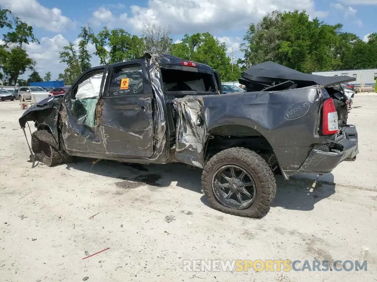 2 Photograph of a damaged car 3C6UR5DL3KG559671 RAM 2500 2019