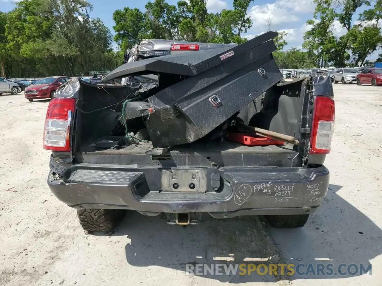 6 Photograph of a damaged car 3C6UR5DL3KG559671 RAM 2500 2019
