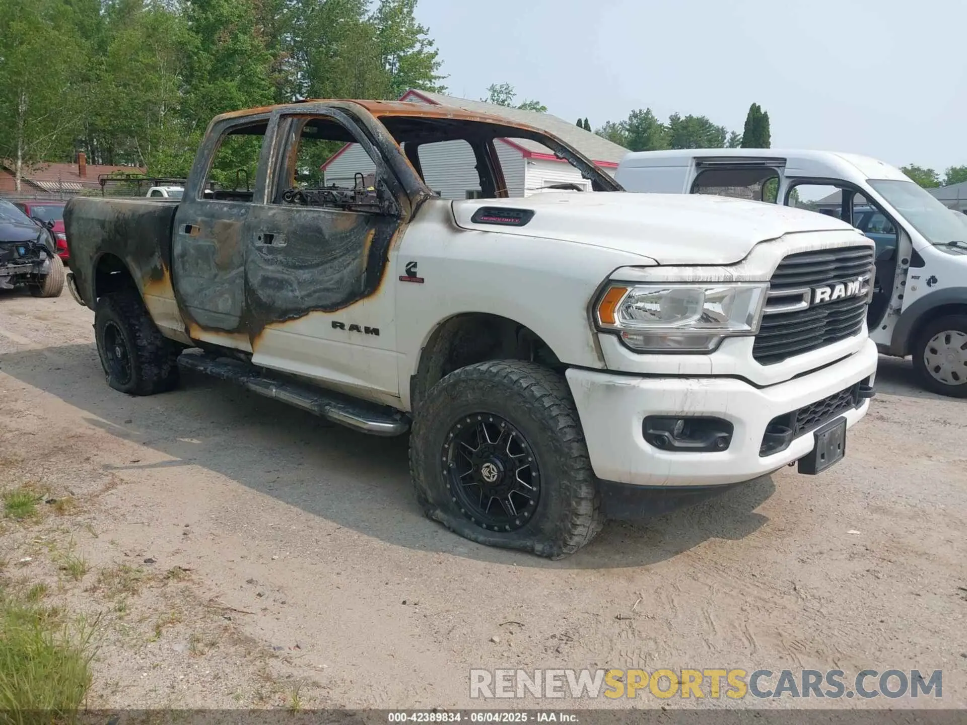 1 Photograph of a damaged car 3C6UR5DL3KG714509 RAM 2500 2019