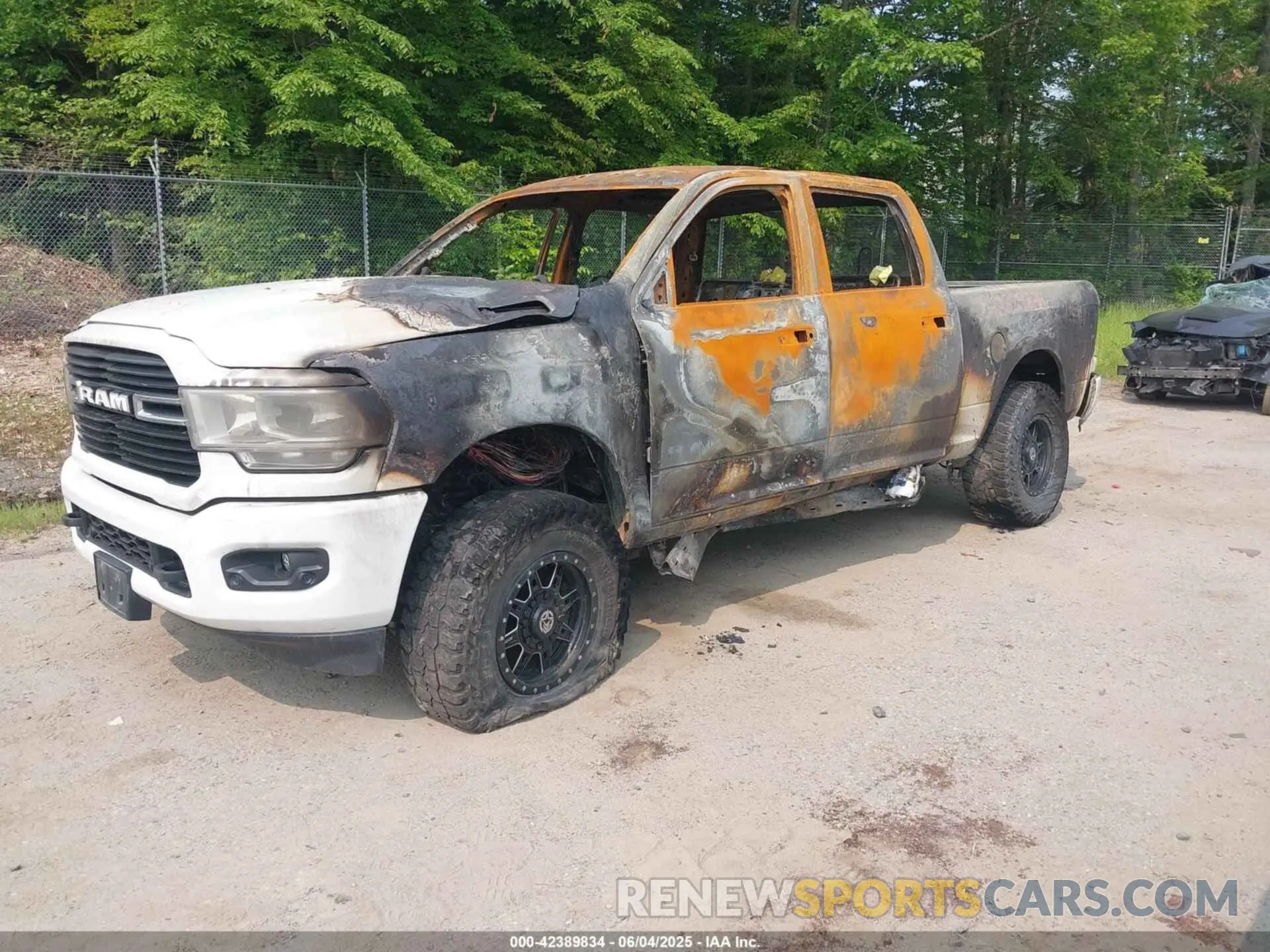 2 Photograph of a damaged car 3C6UR5DL3KG714509 RAM 2500 2019