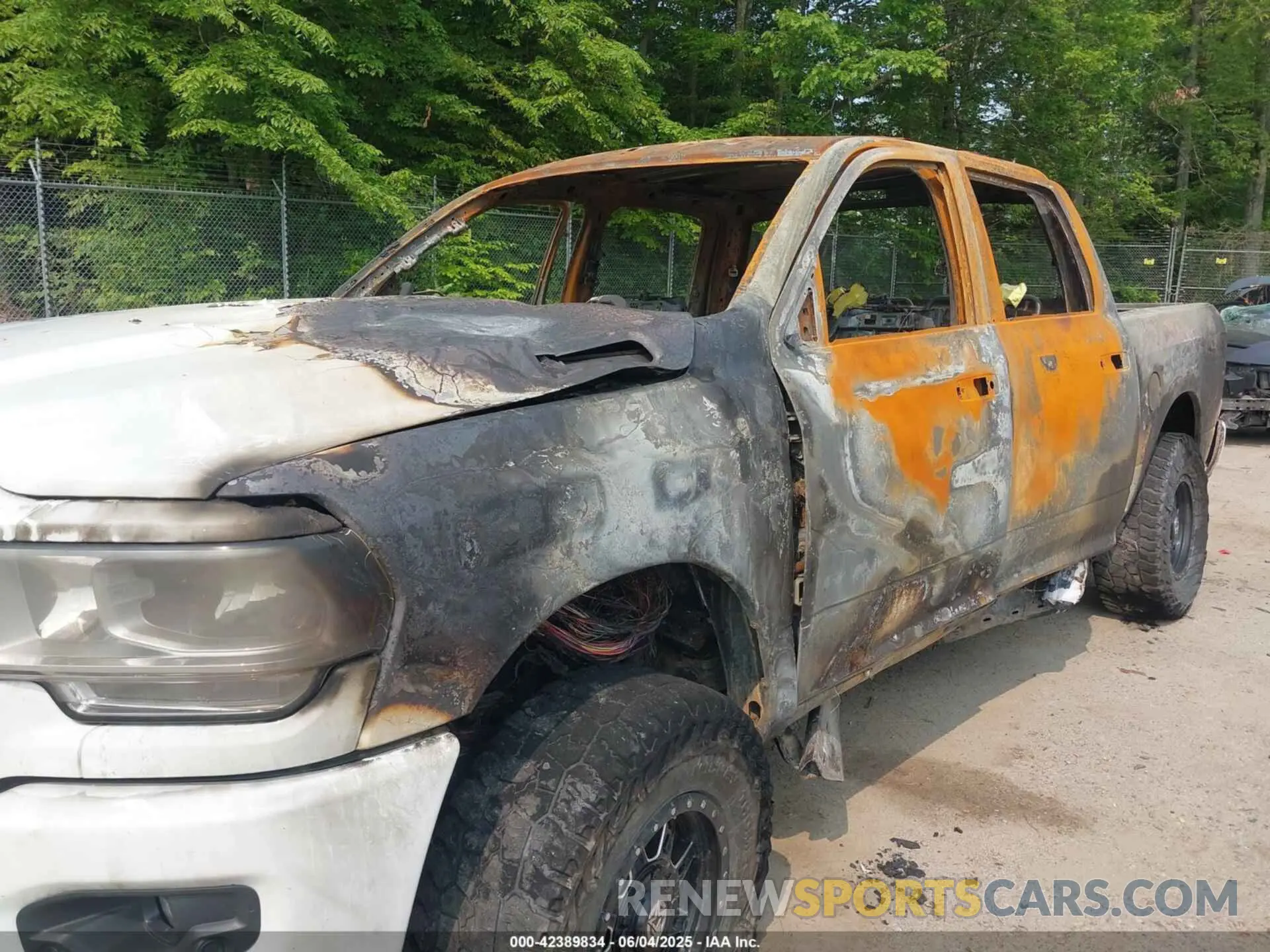6 Photograph of a damaged car 3C6UR5DL3KG714509 RAM 2500 2019