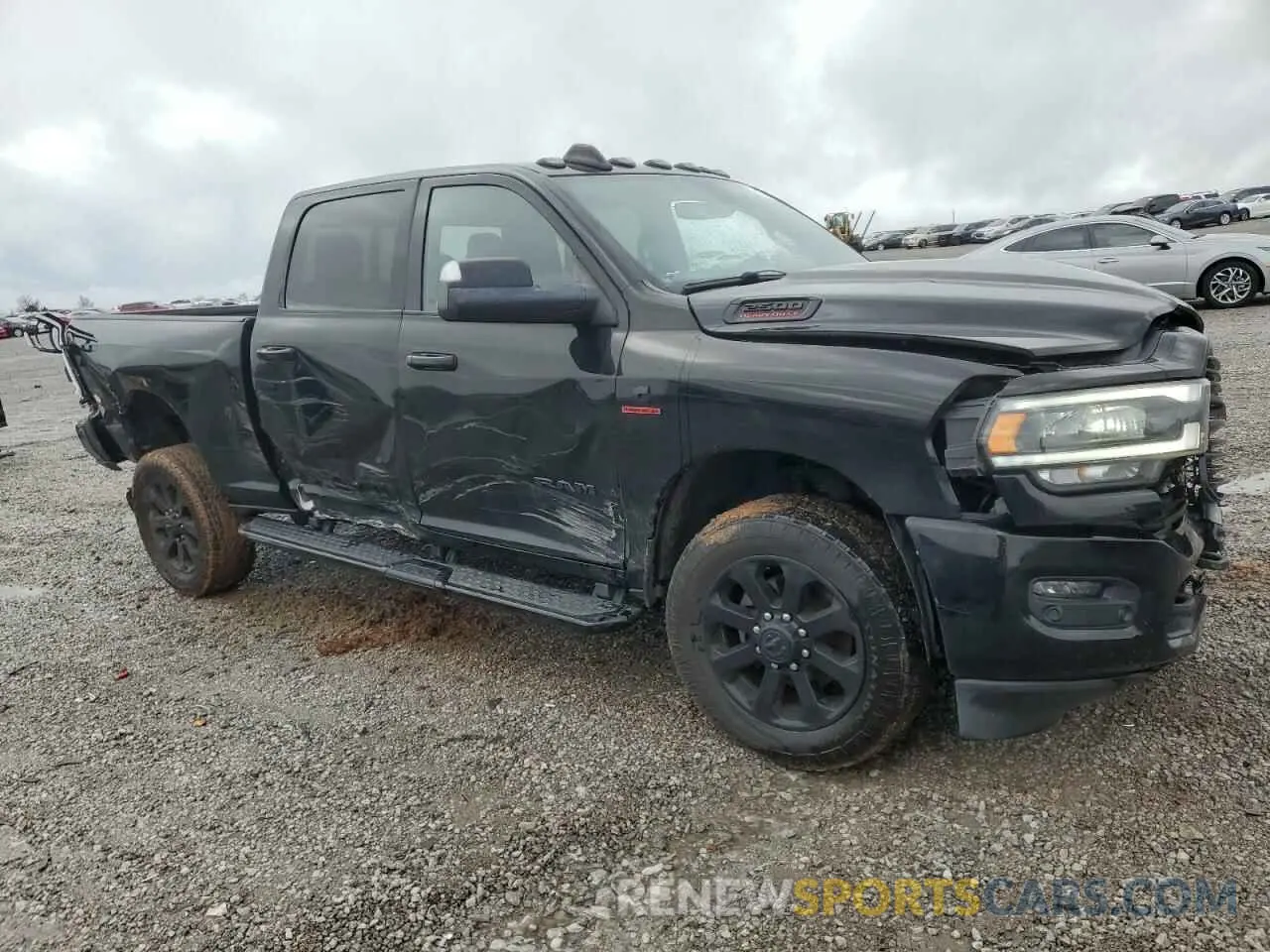 4 Photograph of a damaged car 3C6UR5DL5KG652482 RAM 2500 2019