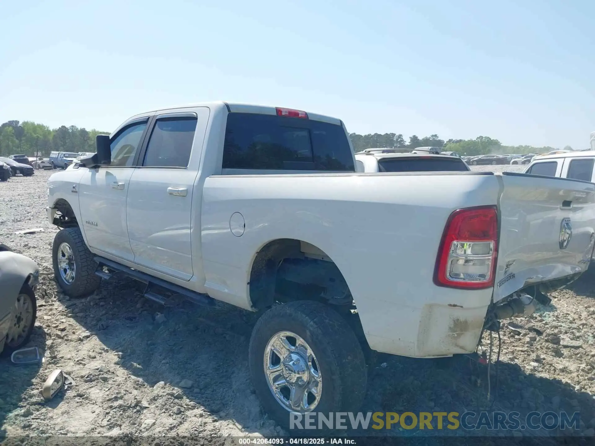14 Photograph of a damaged car 3C6UR5DL7KG531128 RAM 2500 2019