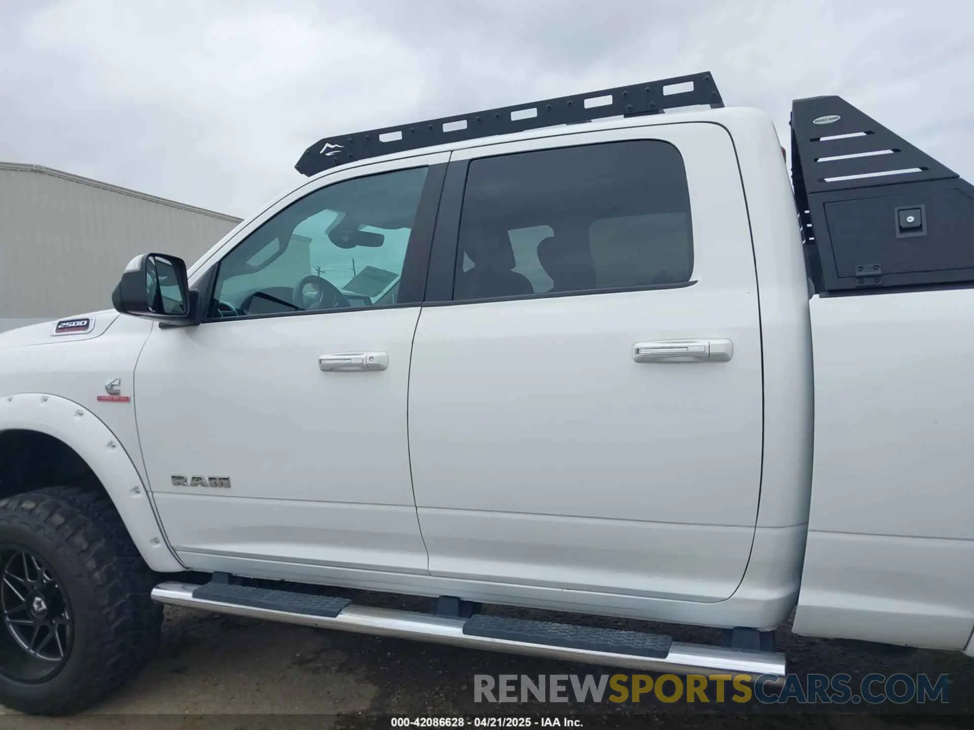 14 Photograph of a damaged car 3C6UR5DL7KG587151 RAM 2500 2019