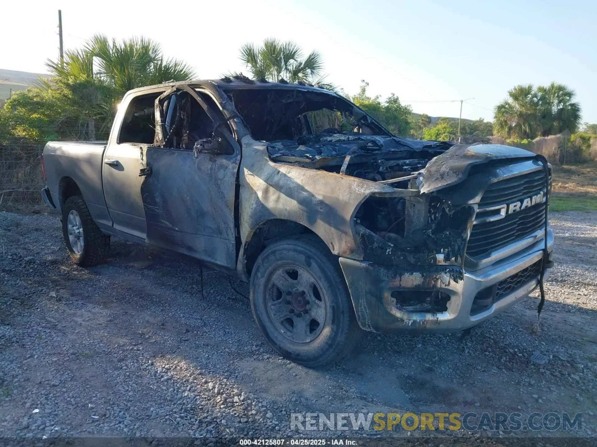 1 Photograph of a damaged car 3C6UR5DL7KG634419 RAM 2500 2019