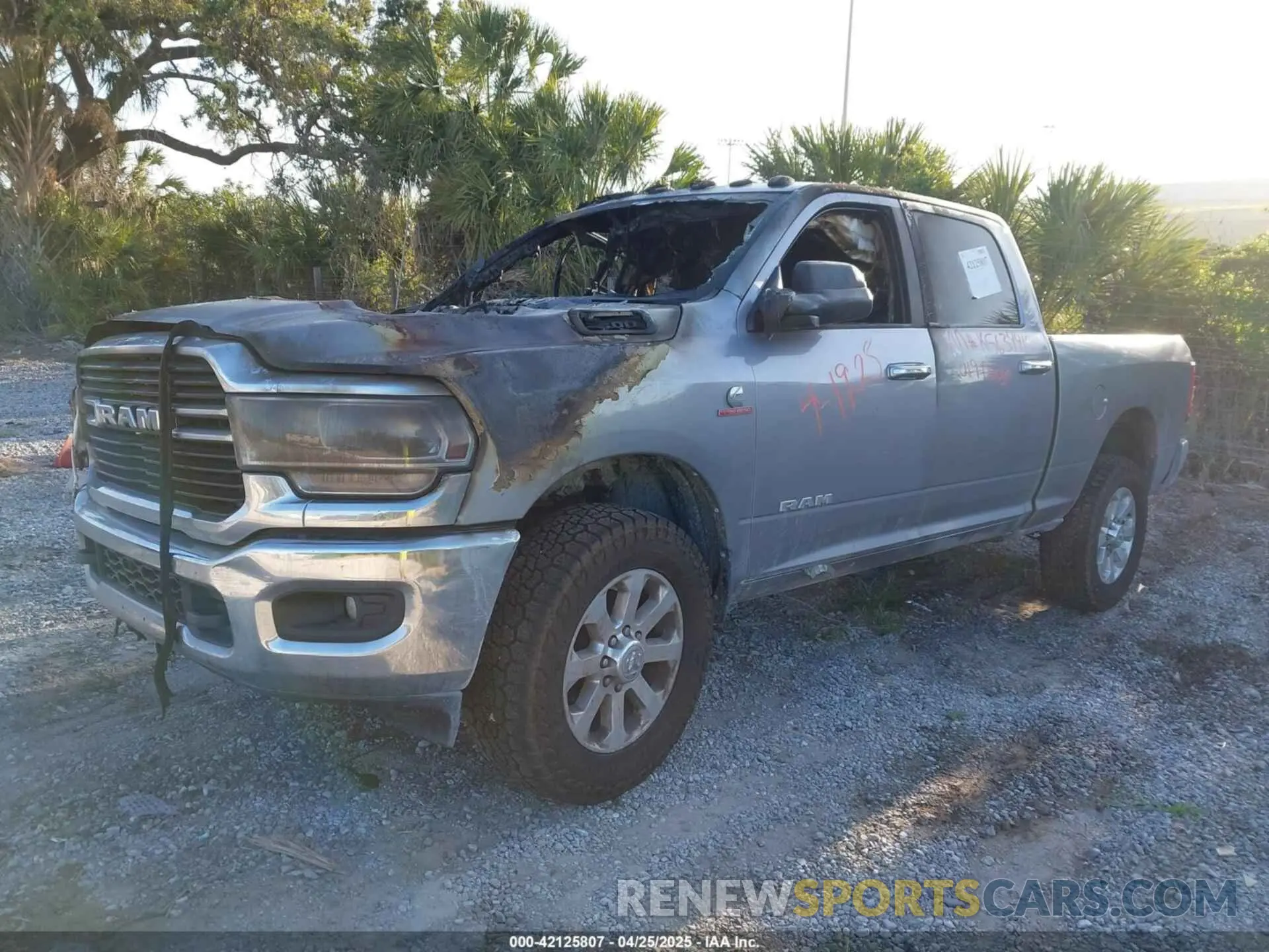 2 Photograph of a damaged car 3C6UR5DL7KG634419 RAM 2500 2019