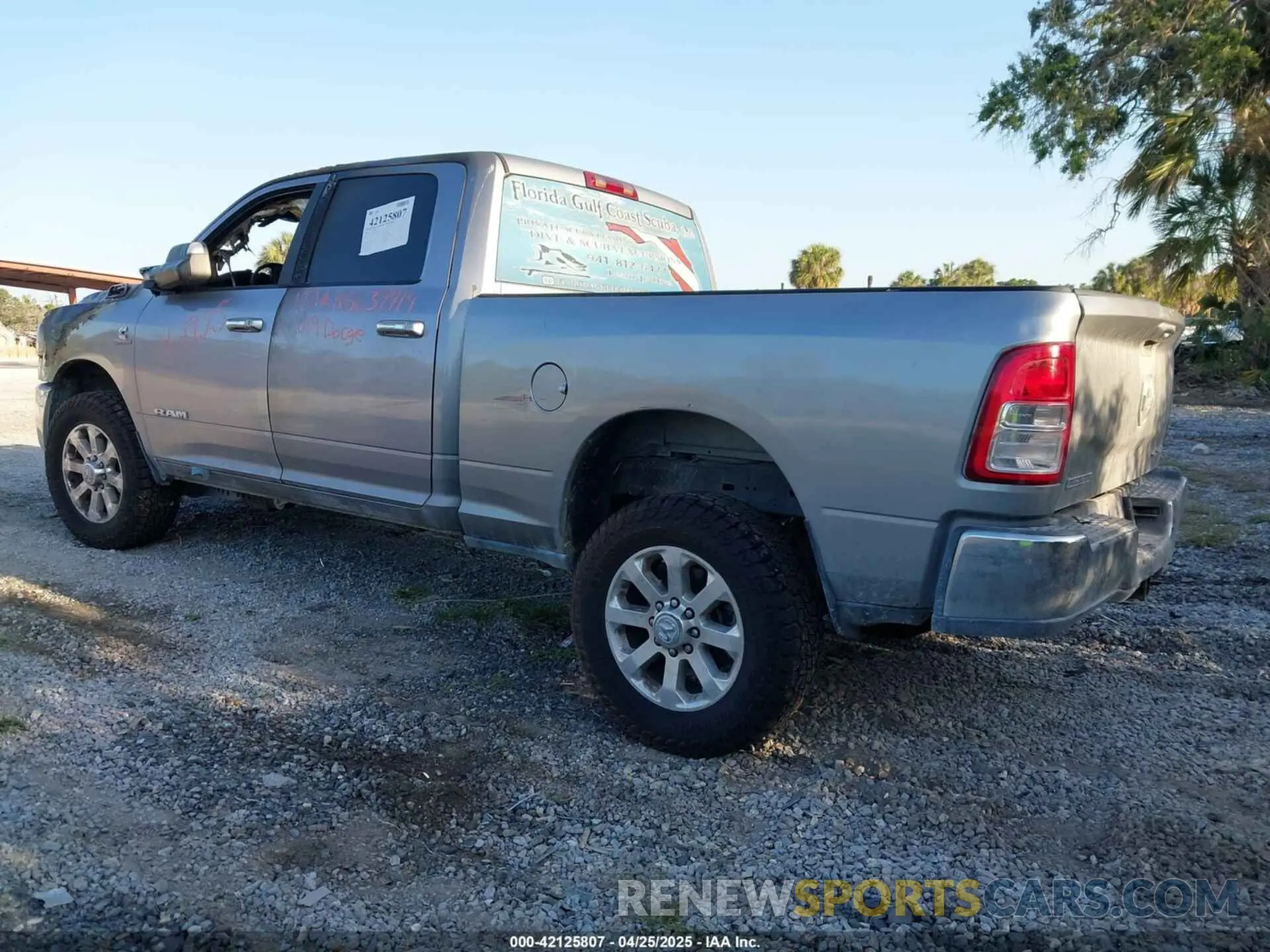 3 Photograph of a damaged car 3C6UR5DL7KG634419 RAM 2500 2019