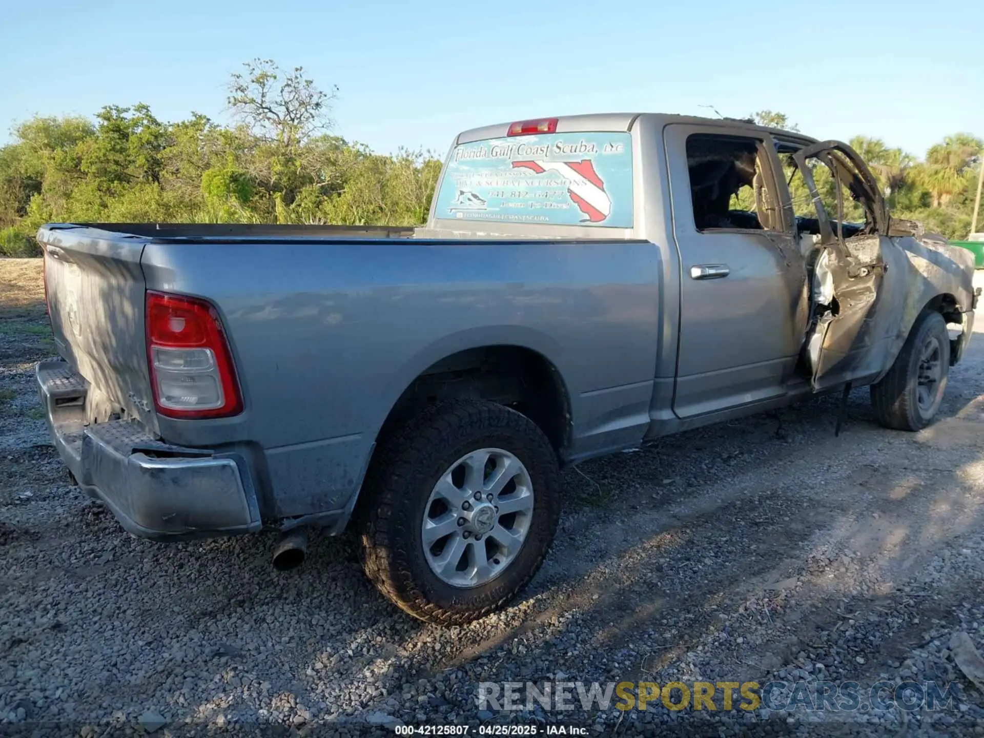 4 Photograph of a damaged car 3C6UR5DL7KG634419 RAM 2500 2019