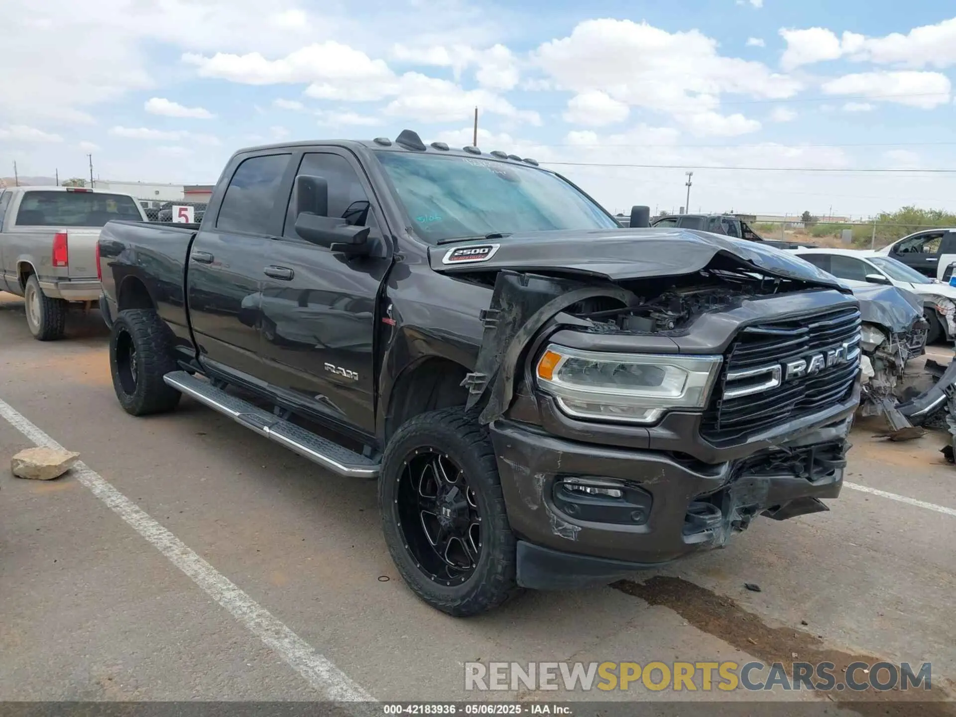 1 Photograph of a damaged car 3C6UR5DL9KG604368 RAM 2500 2019