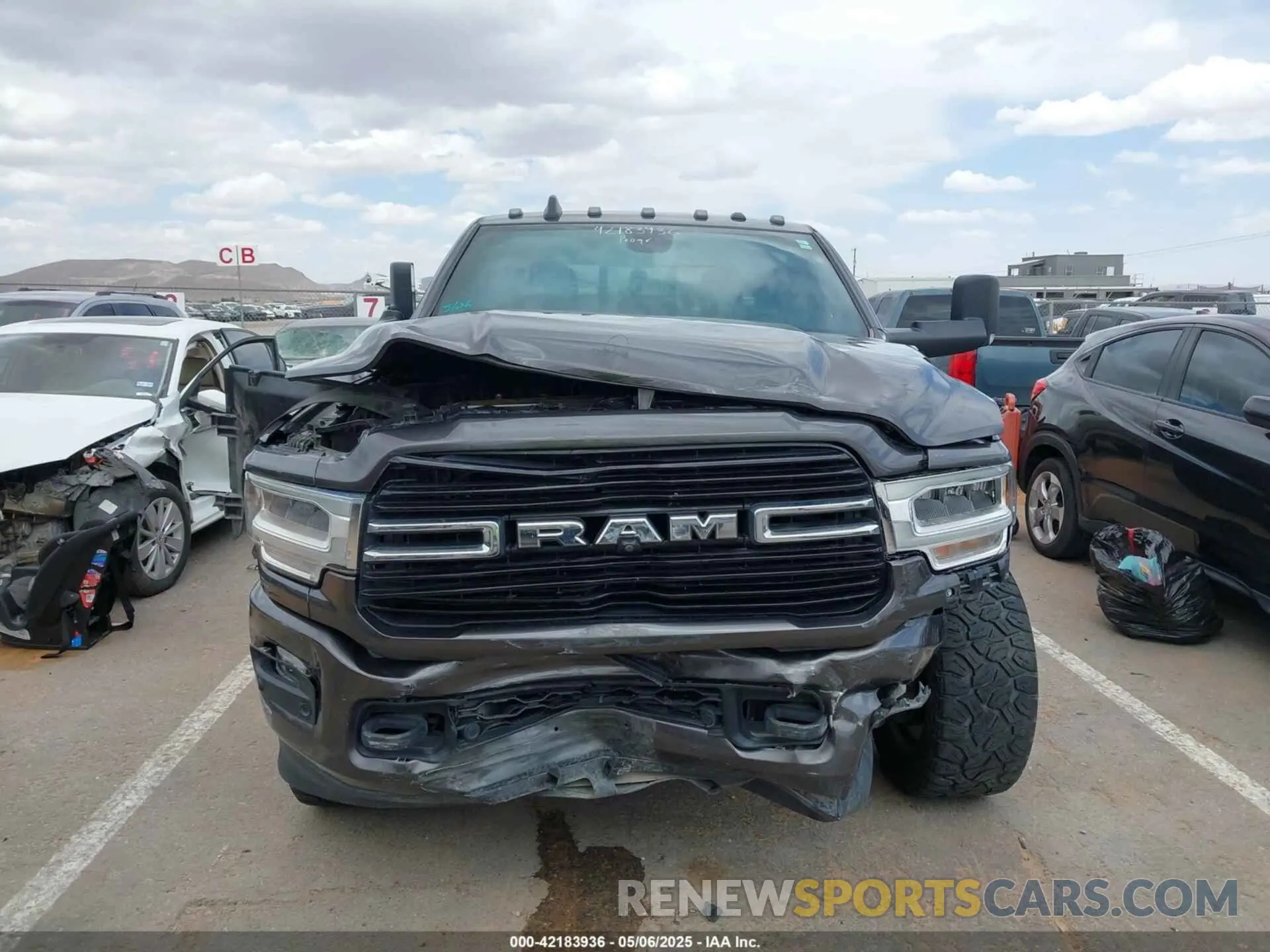 12 Photograph of a damaged car 3C6UR5DL9KG604368 RAM 2500 2019