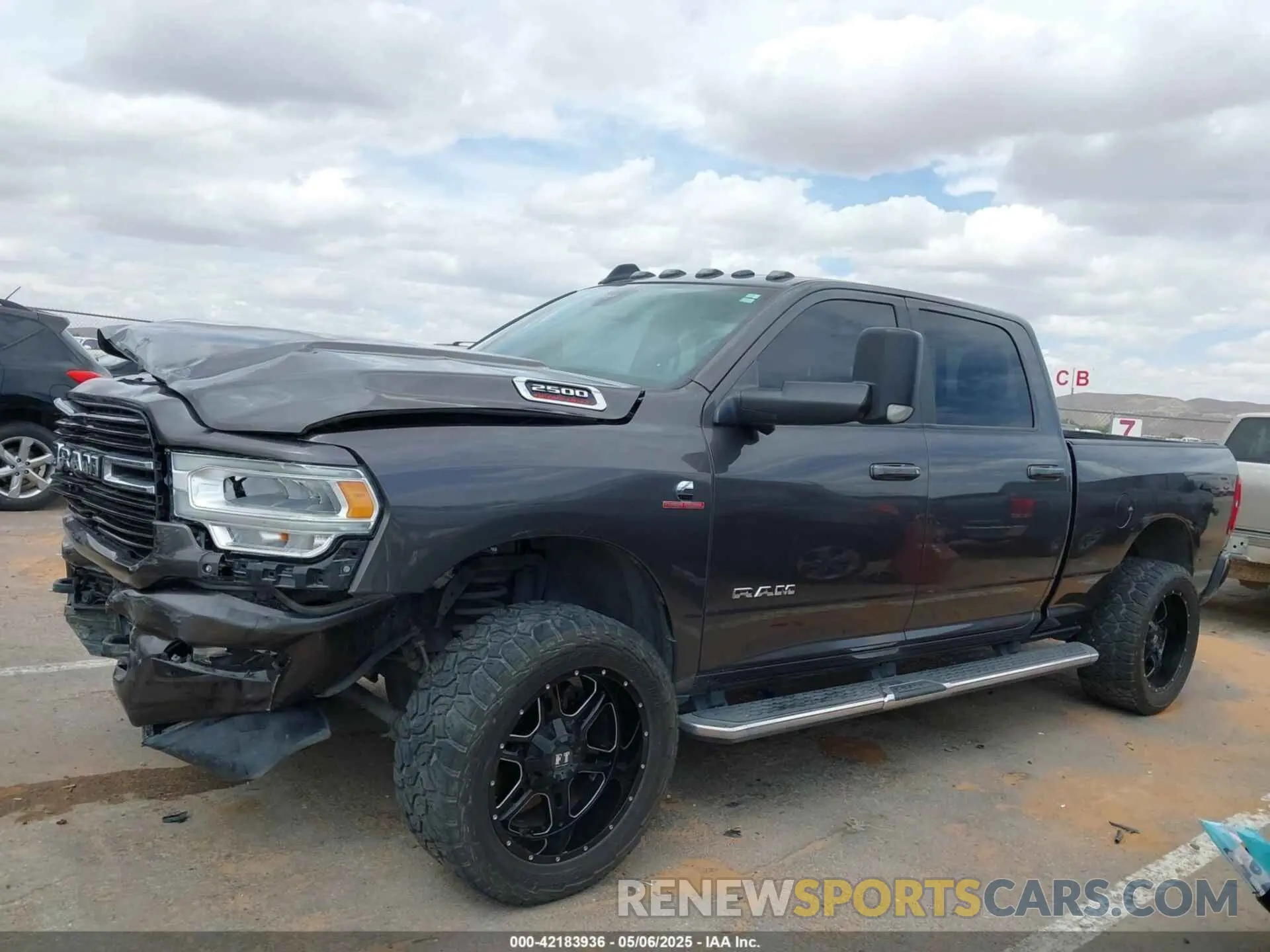 14 Photograph of a damaged car 3C6UR5DL9KG604368 RAM 2500 2019