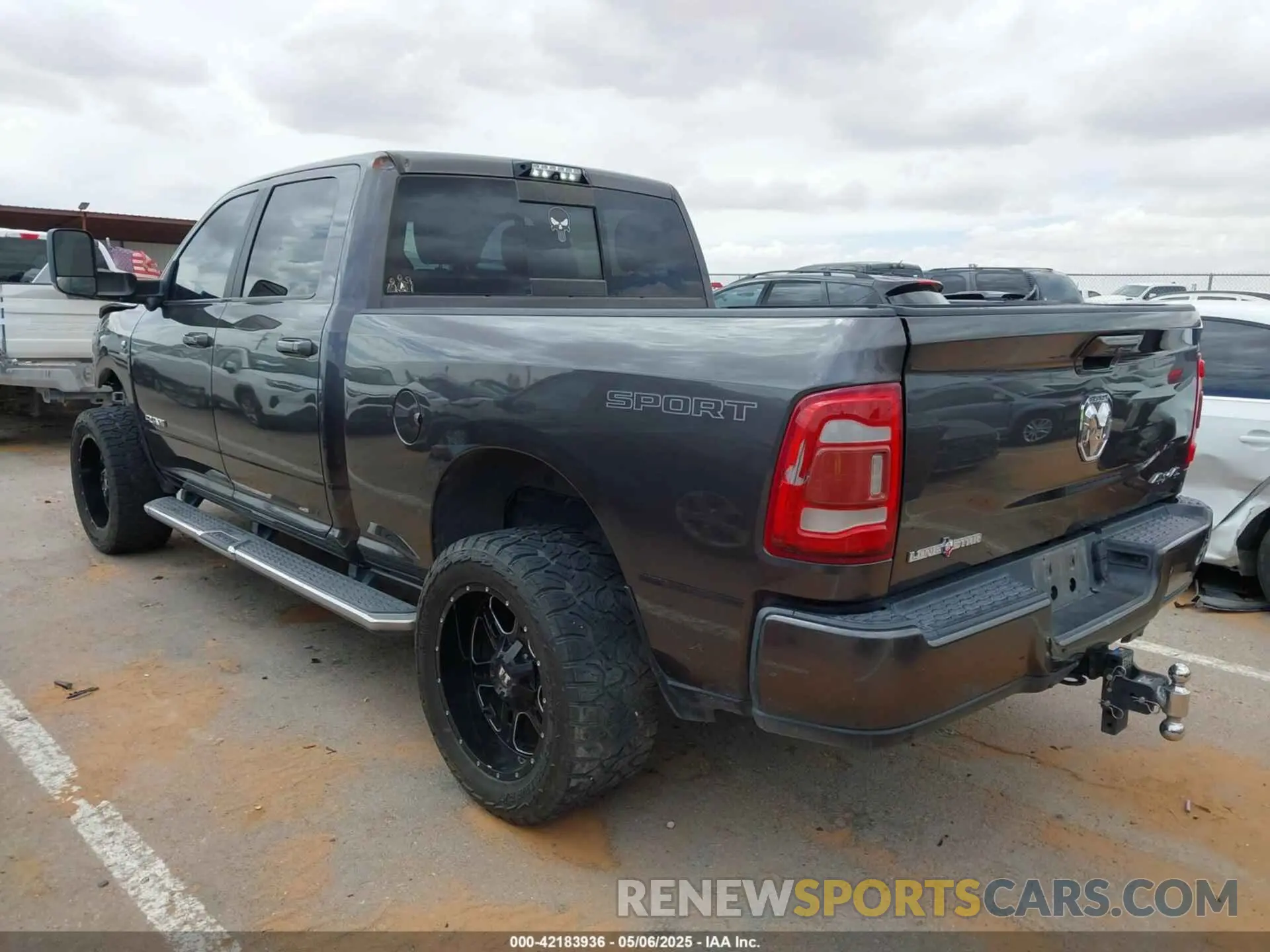 3 Photograph of a damaged car 3C6UR5DL9KG604368 RAM 2500 2019